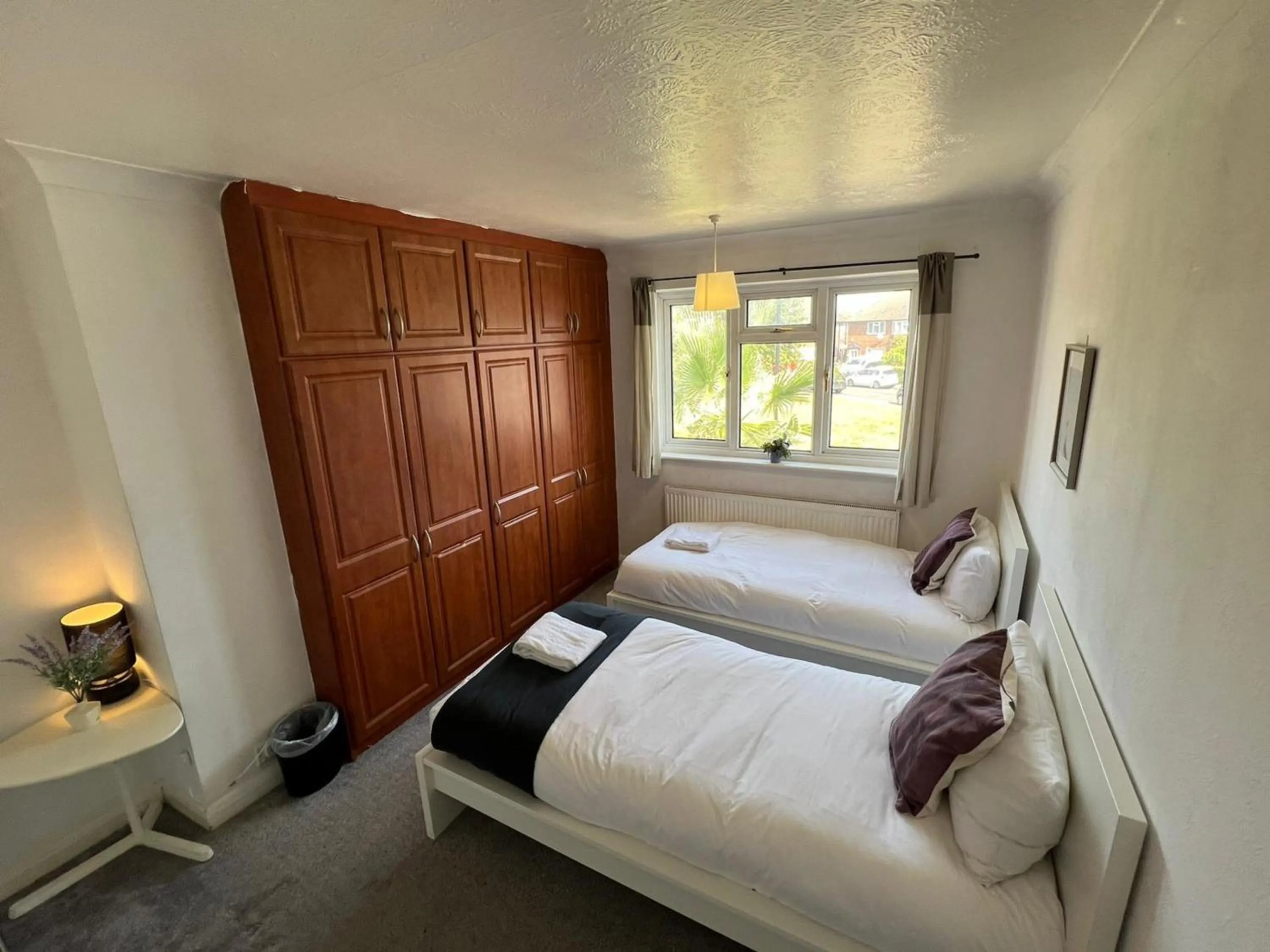 Bed in Airport Garden Rooms