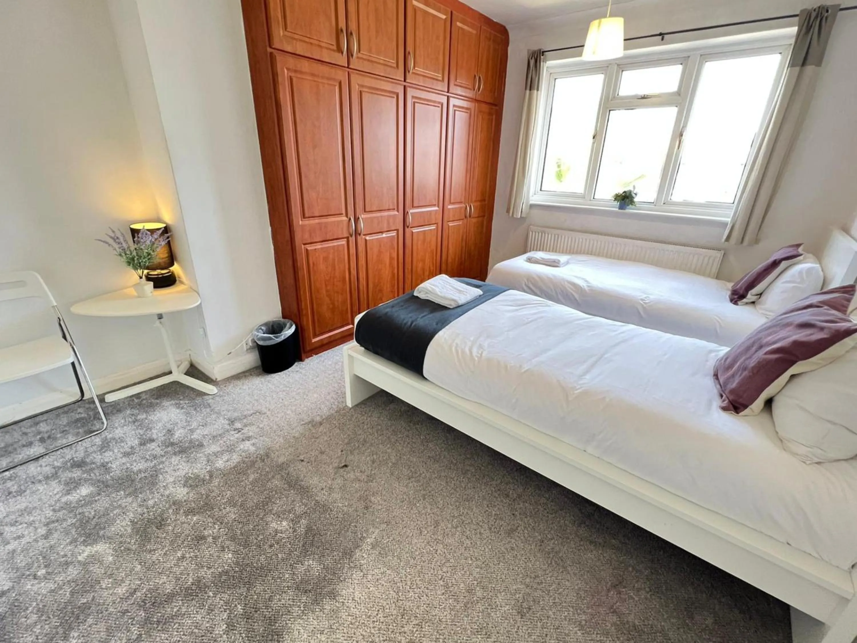 Bed in Airport Garden Rooms