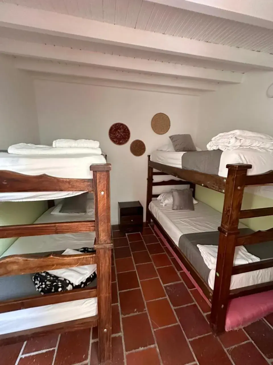 Economy Quadruple Room with Shared Bathroom in Casa de Pinos Hotel Economy Quadruple Room with Shared Bathroom in Casa de Pinos Hotel