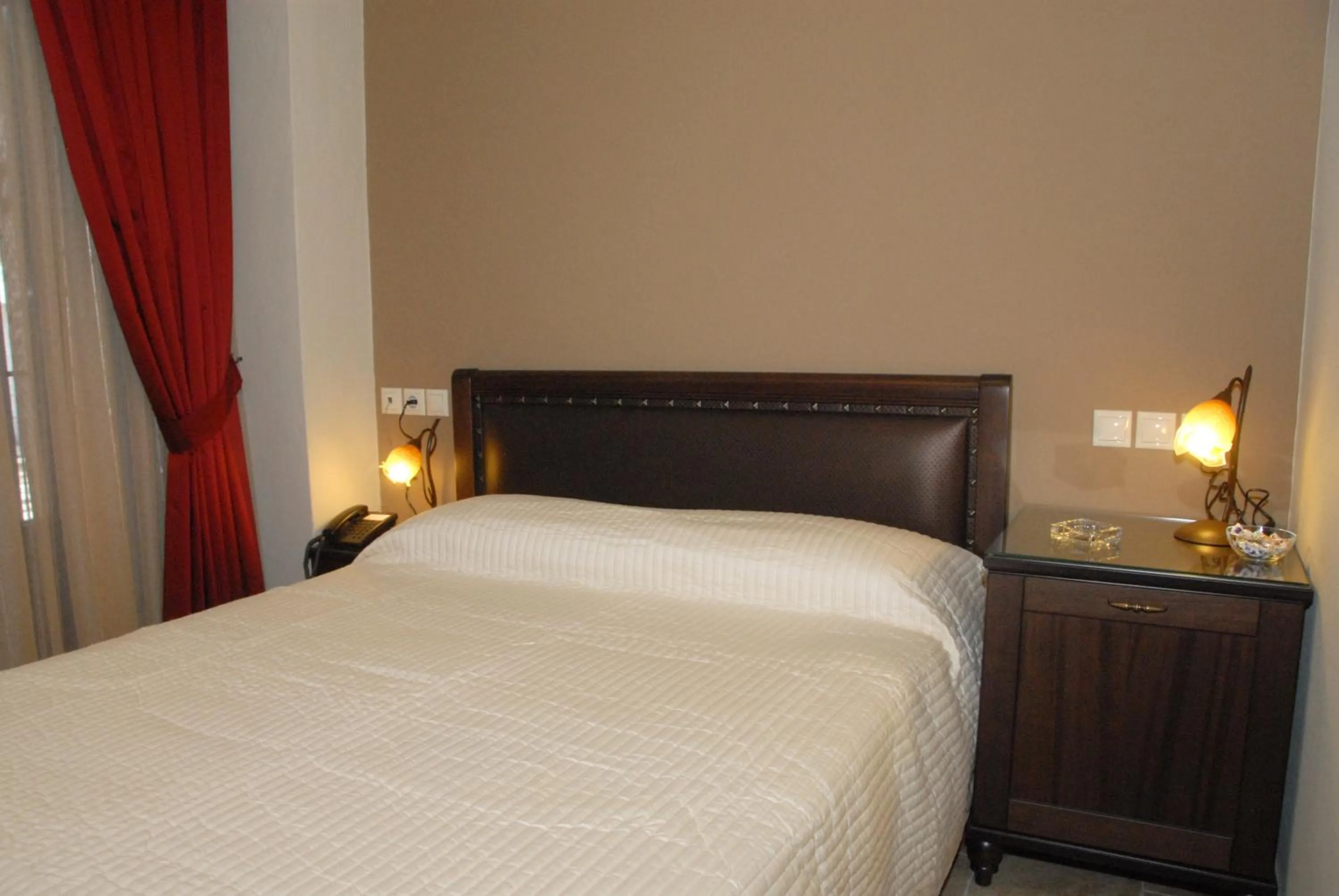 Bed in Hotel Filoxenia