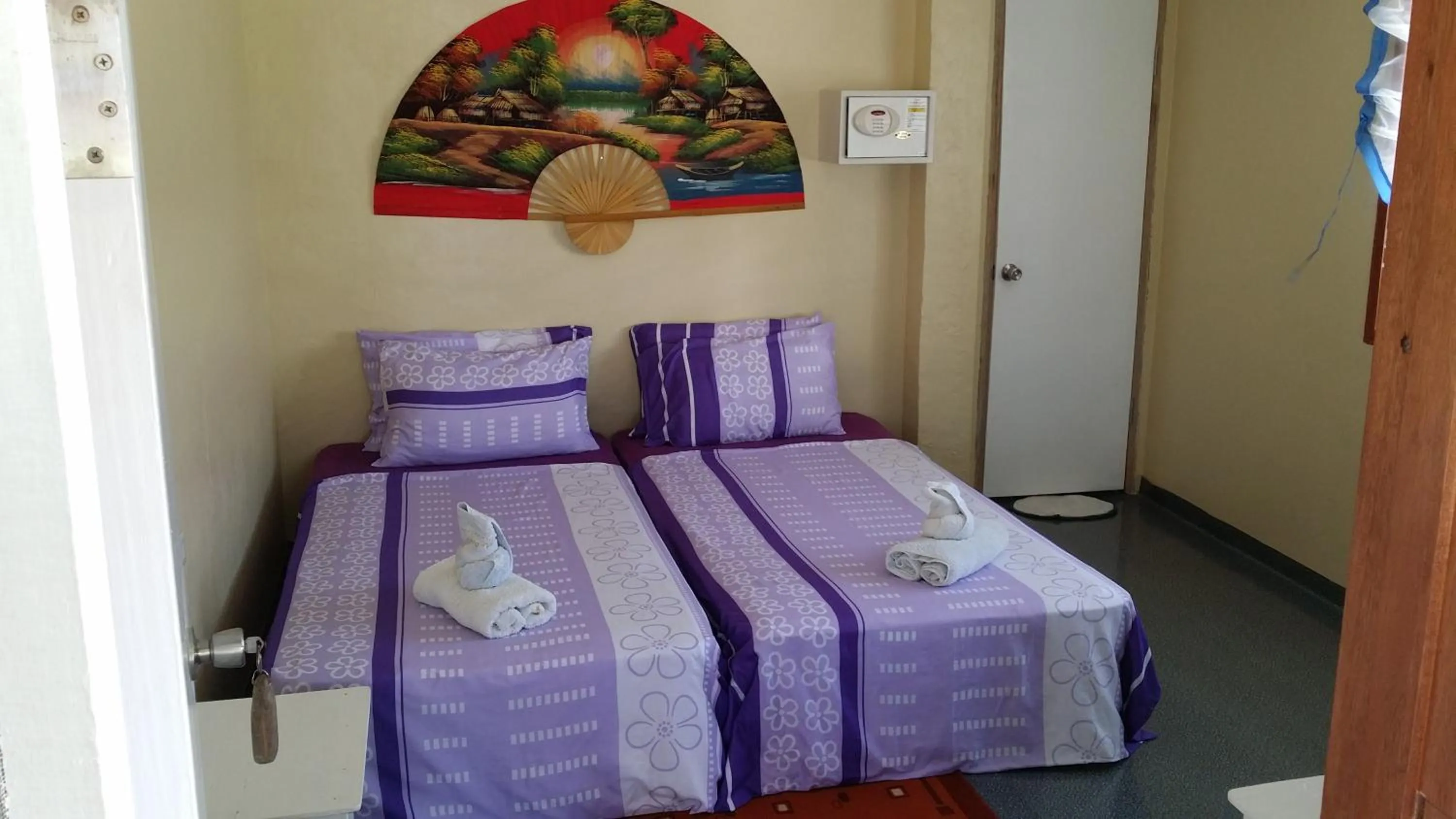 Bed in AABANA Beach & Watersport Resort