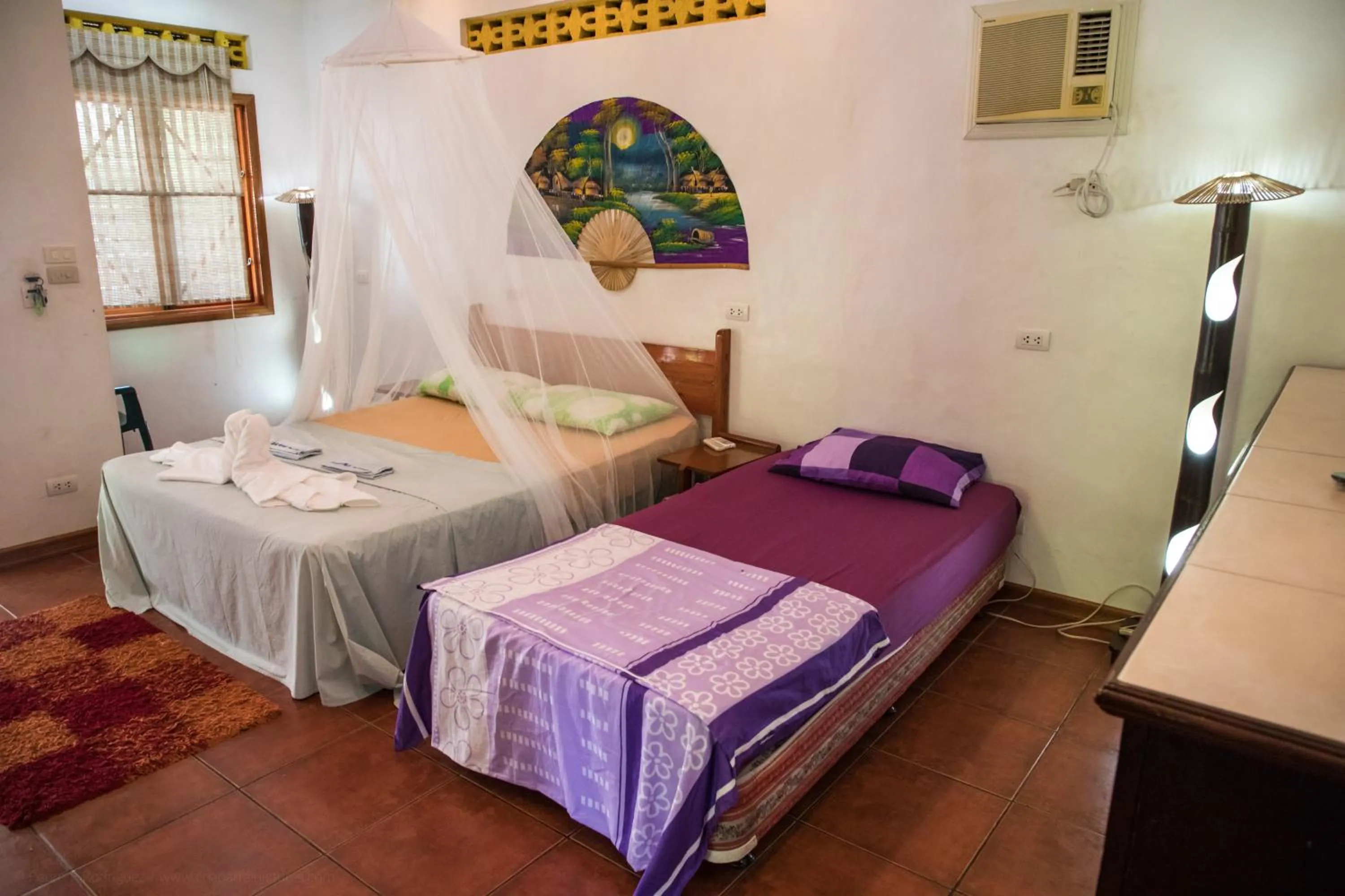 Bed in AABANA Beach & Watersport Resort