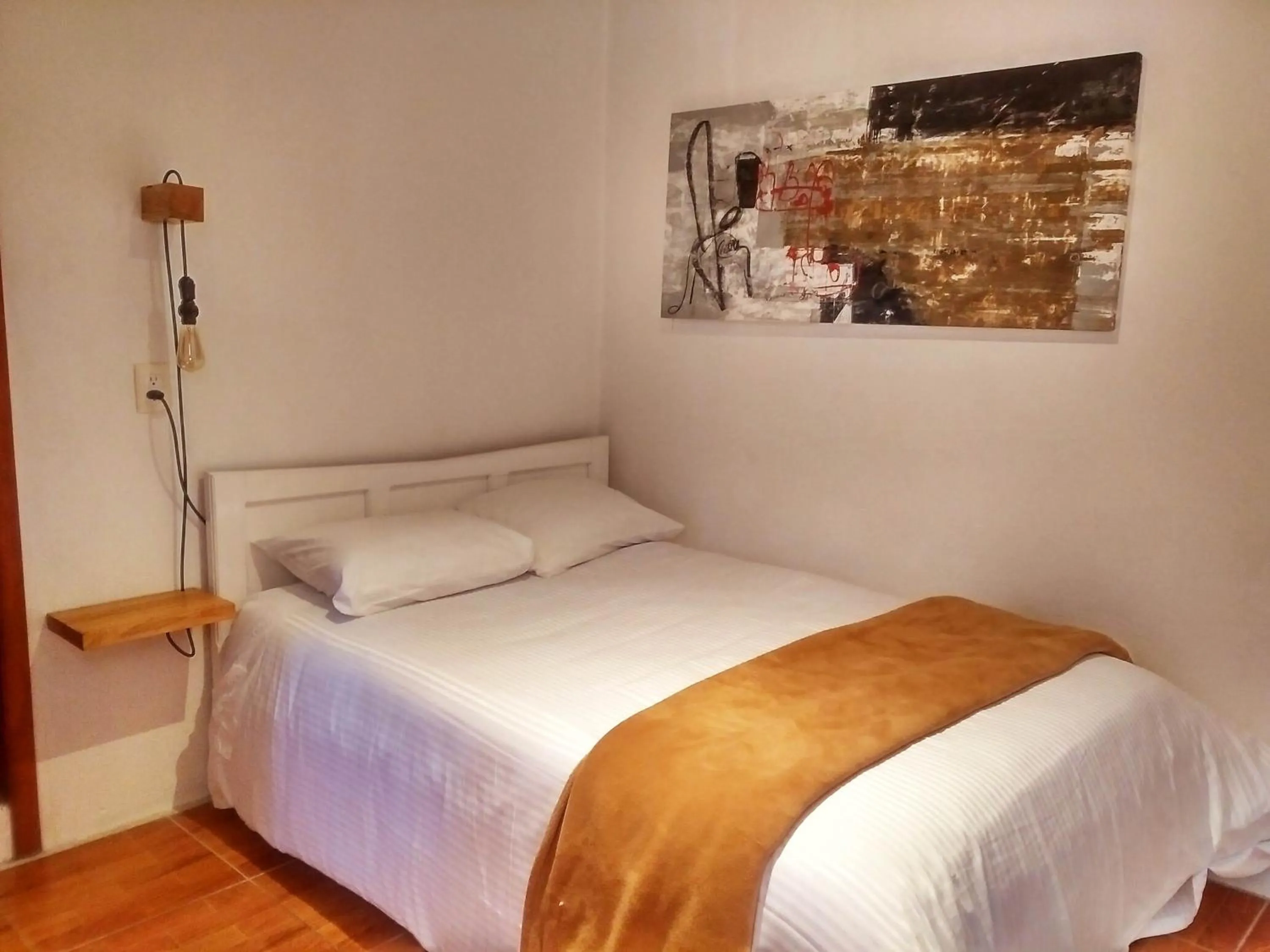 Photo of the whole room, Bed in La Tozi Hotel