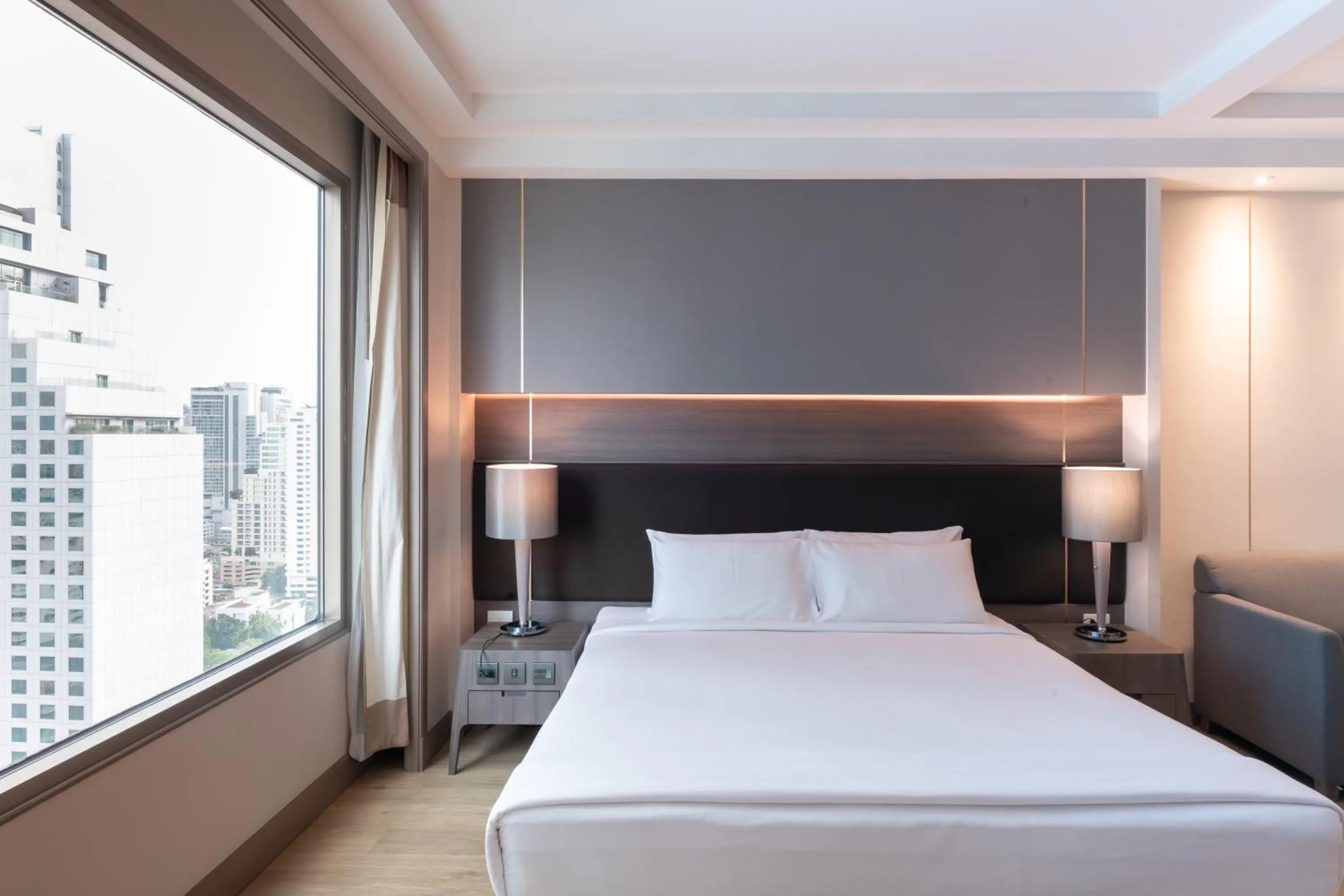 Bed in Jasmine City Hotel