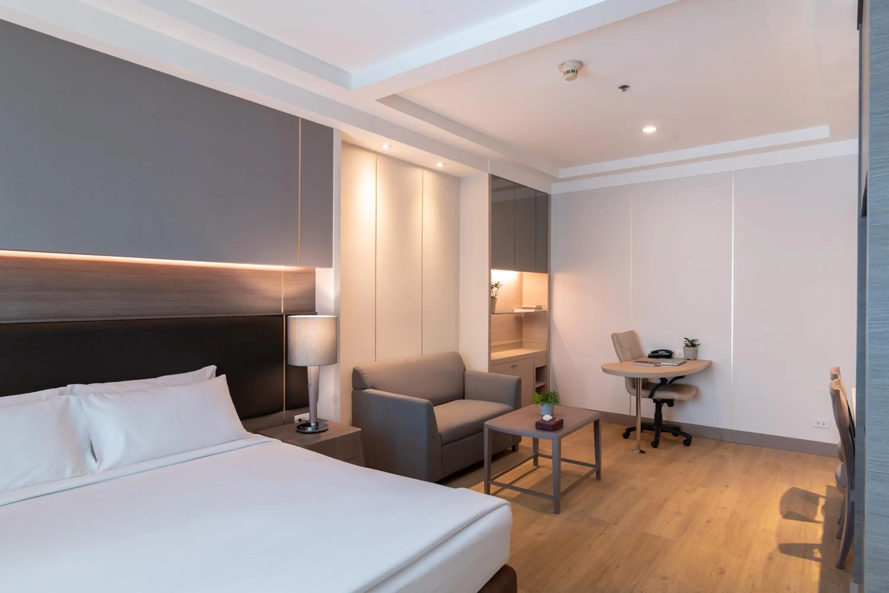 Bed in Jasmine City Hotel