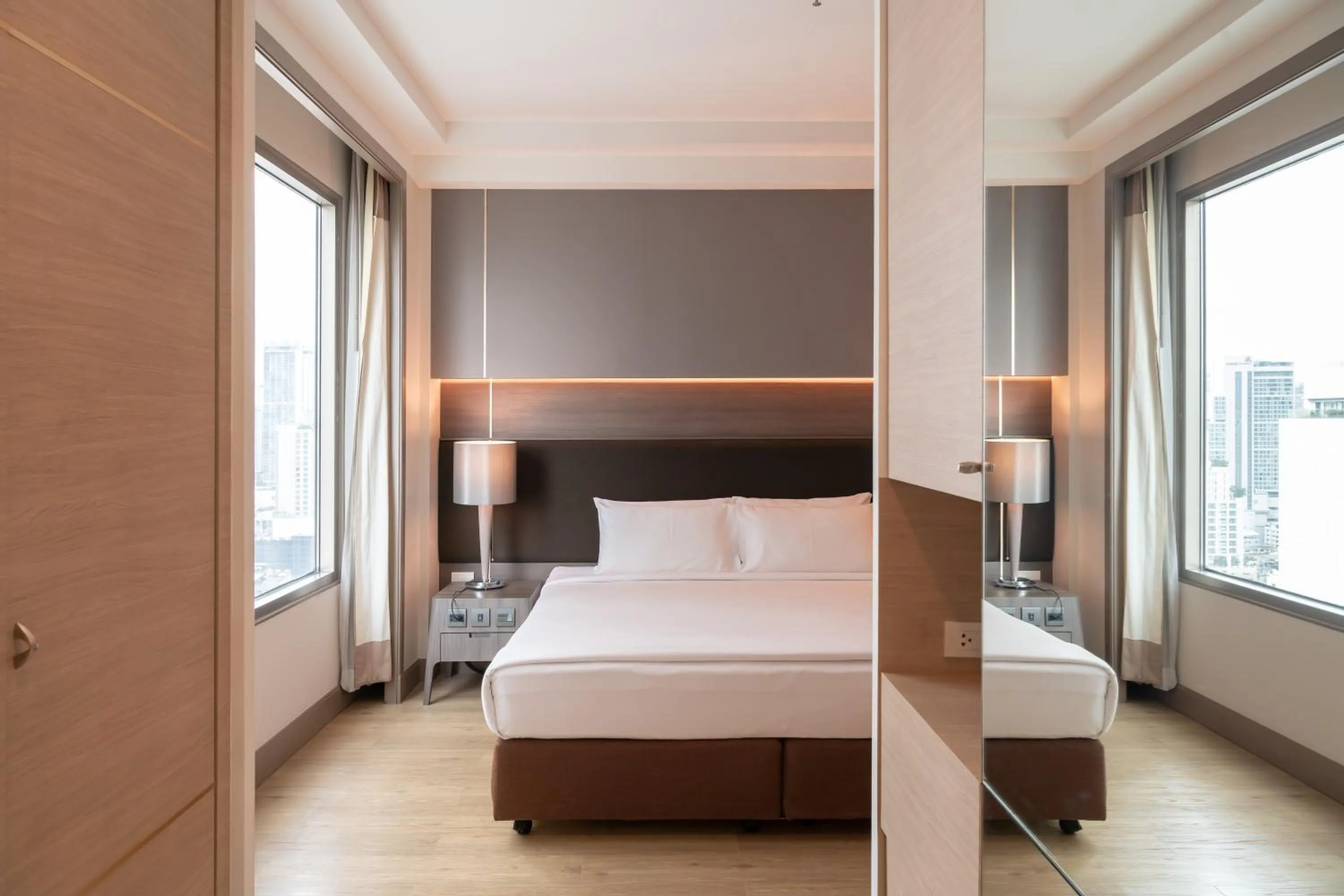 Bed in Jasmine City Hotel