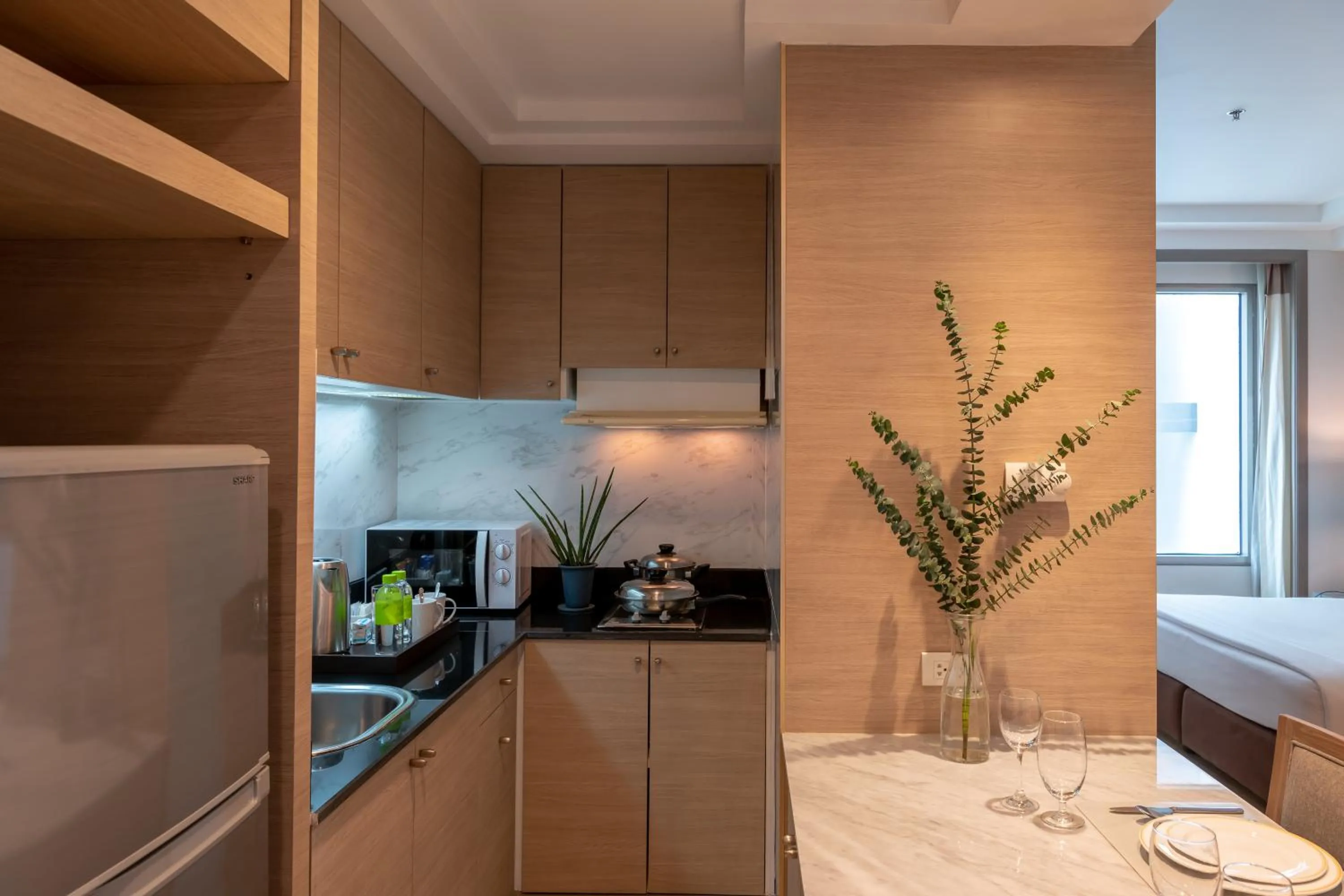 Kitchen or kitchenette in Jasmine City Hotel