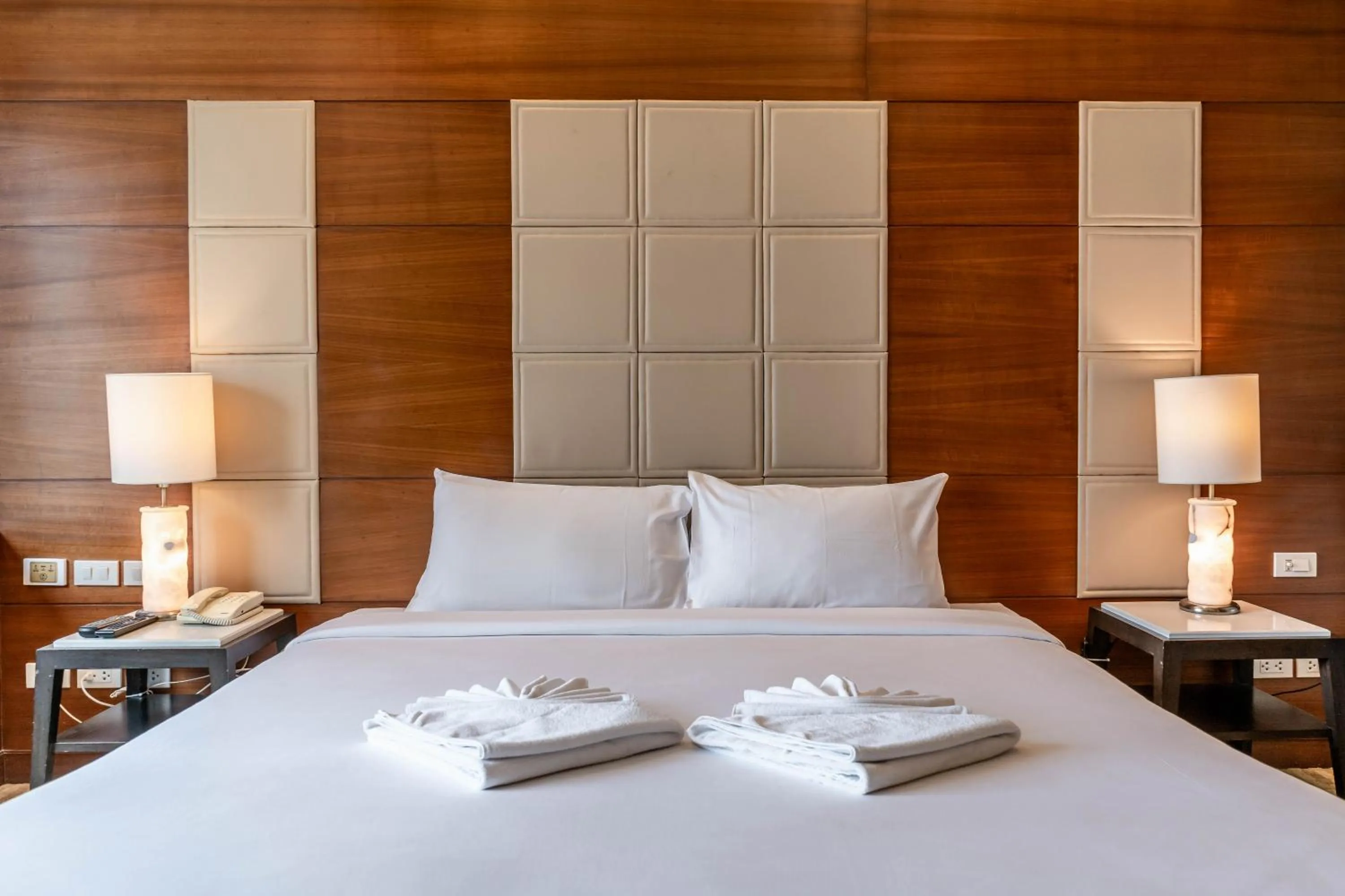 Bed in Jasmine City Hotel