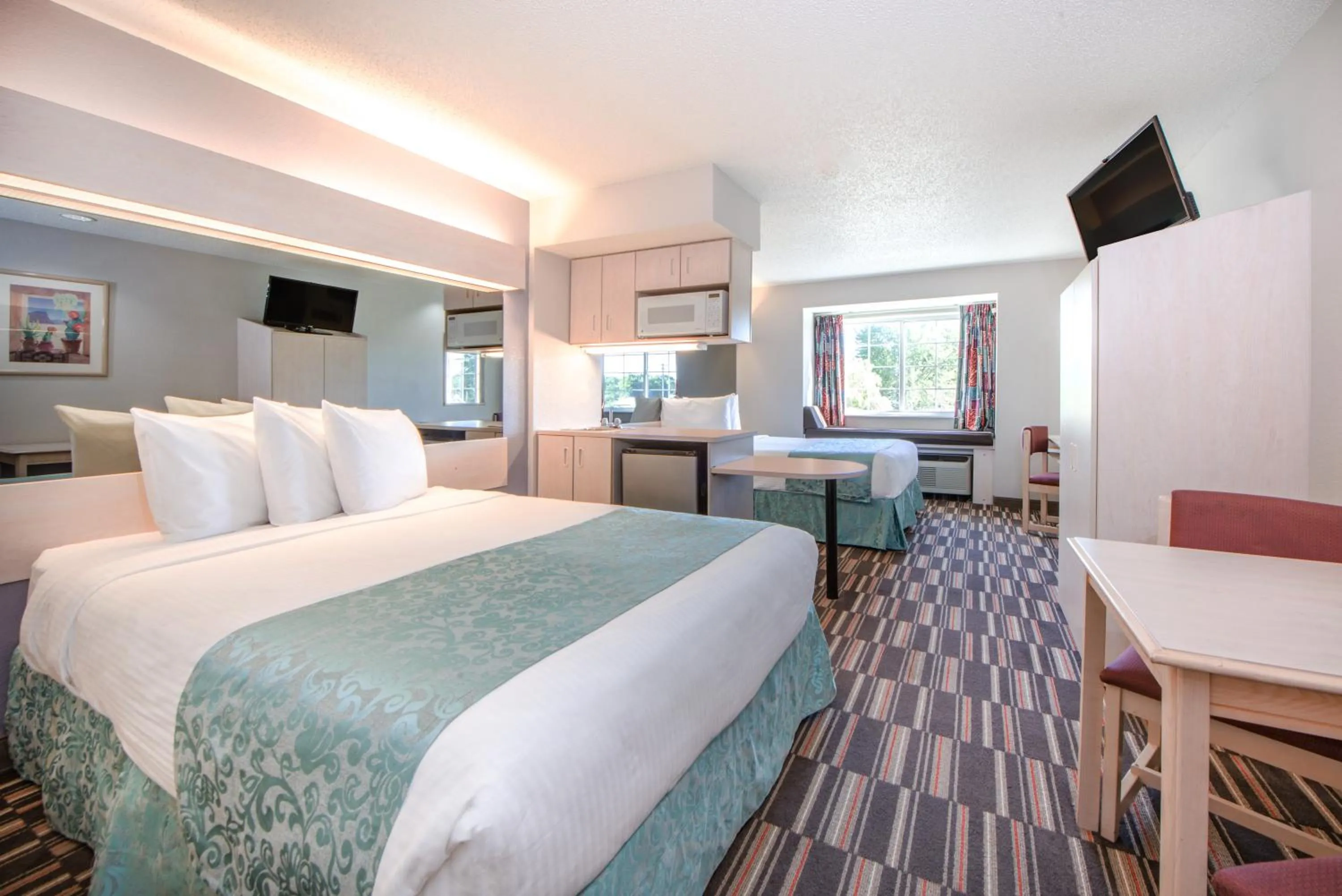 Bed in Microtel Inn & Suites Claremore Route 66