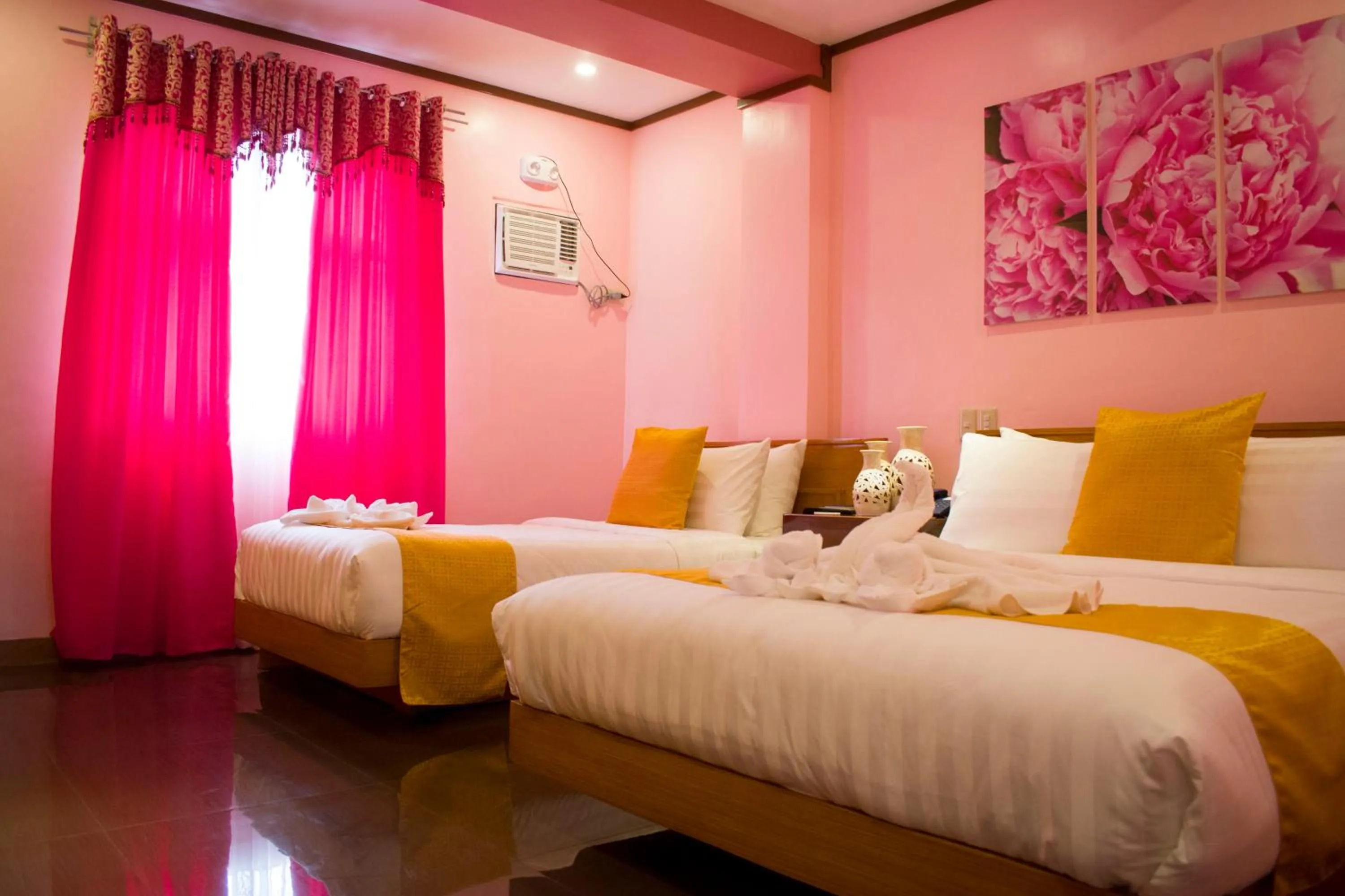 Bed in Royal Mansion Hotel