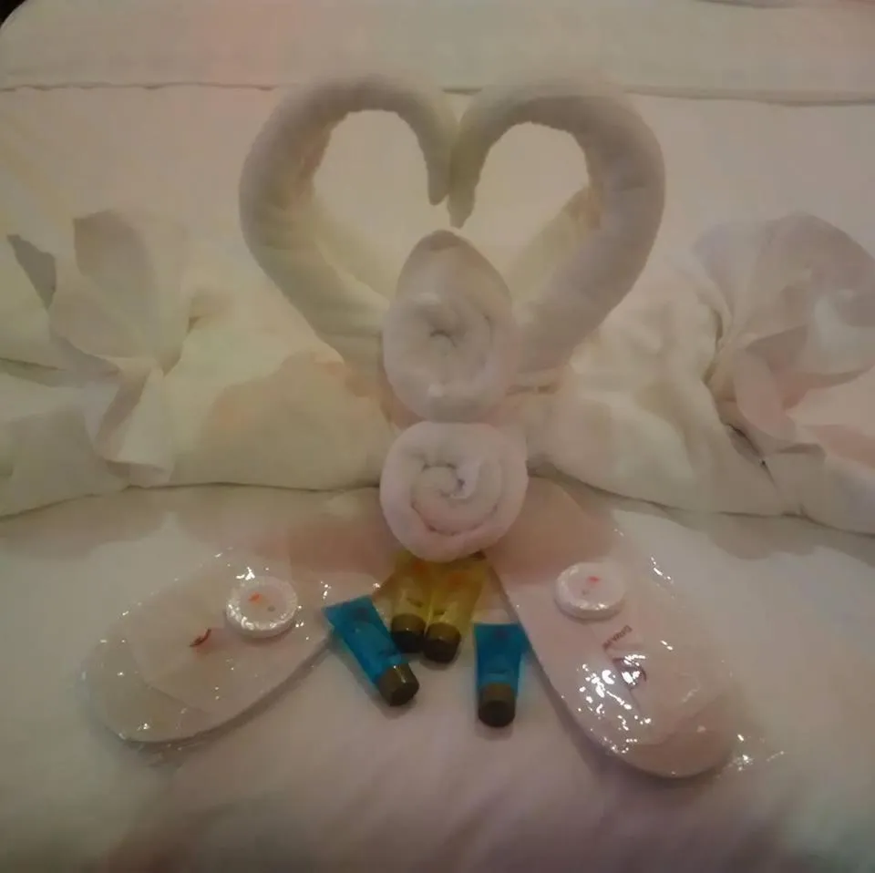 Bed in Royal Mansion Hotel