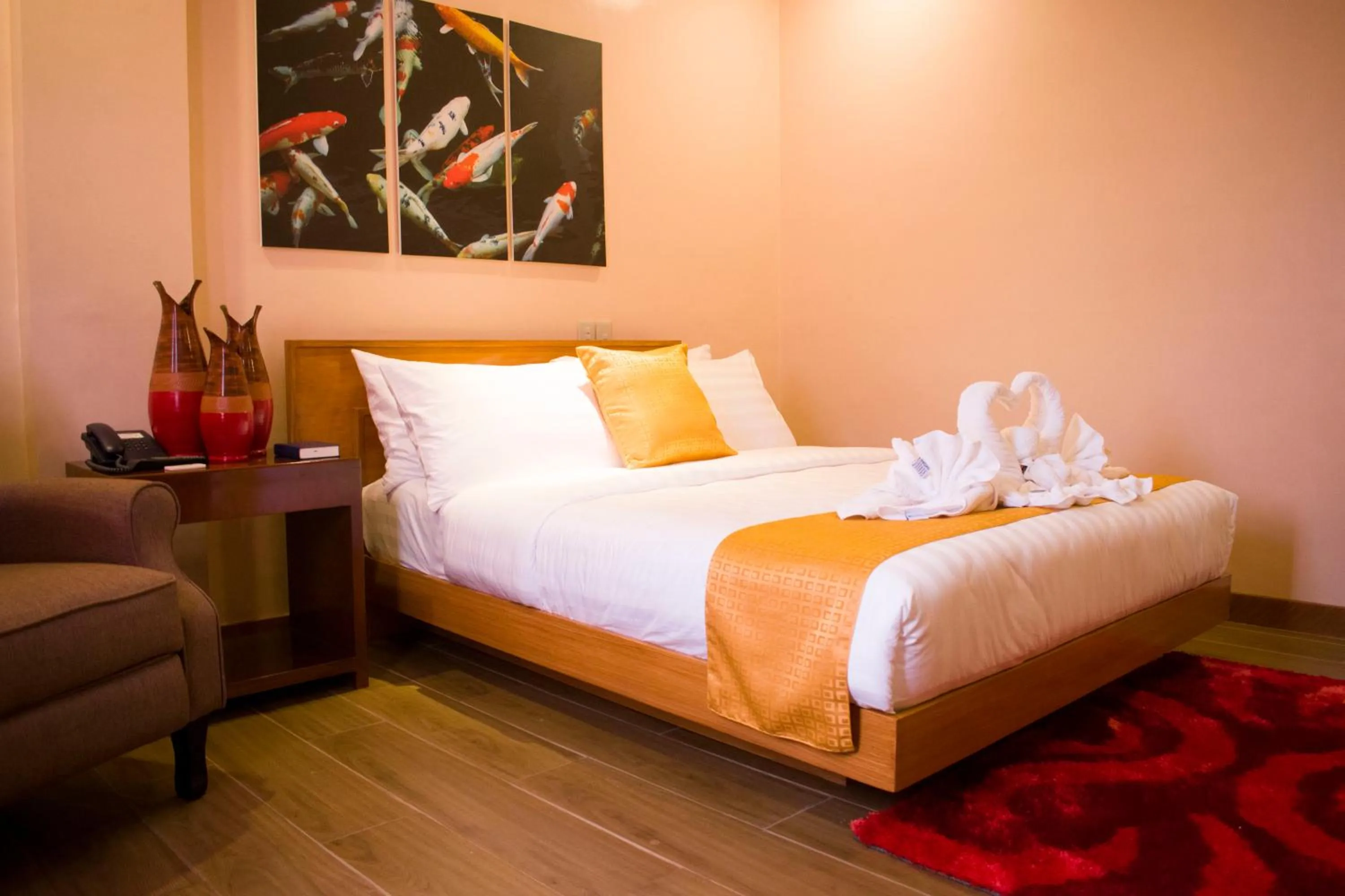 Bed in Royal Mansion Hotel