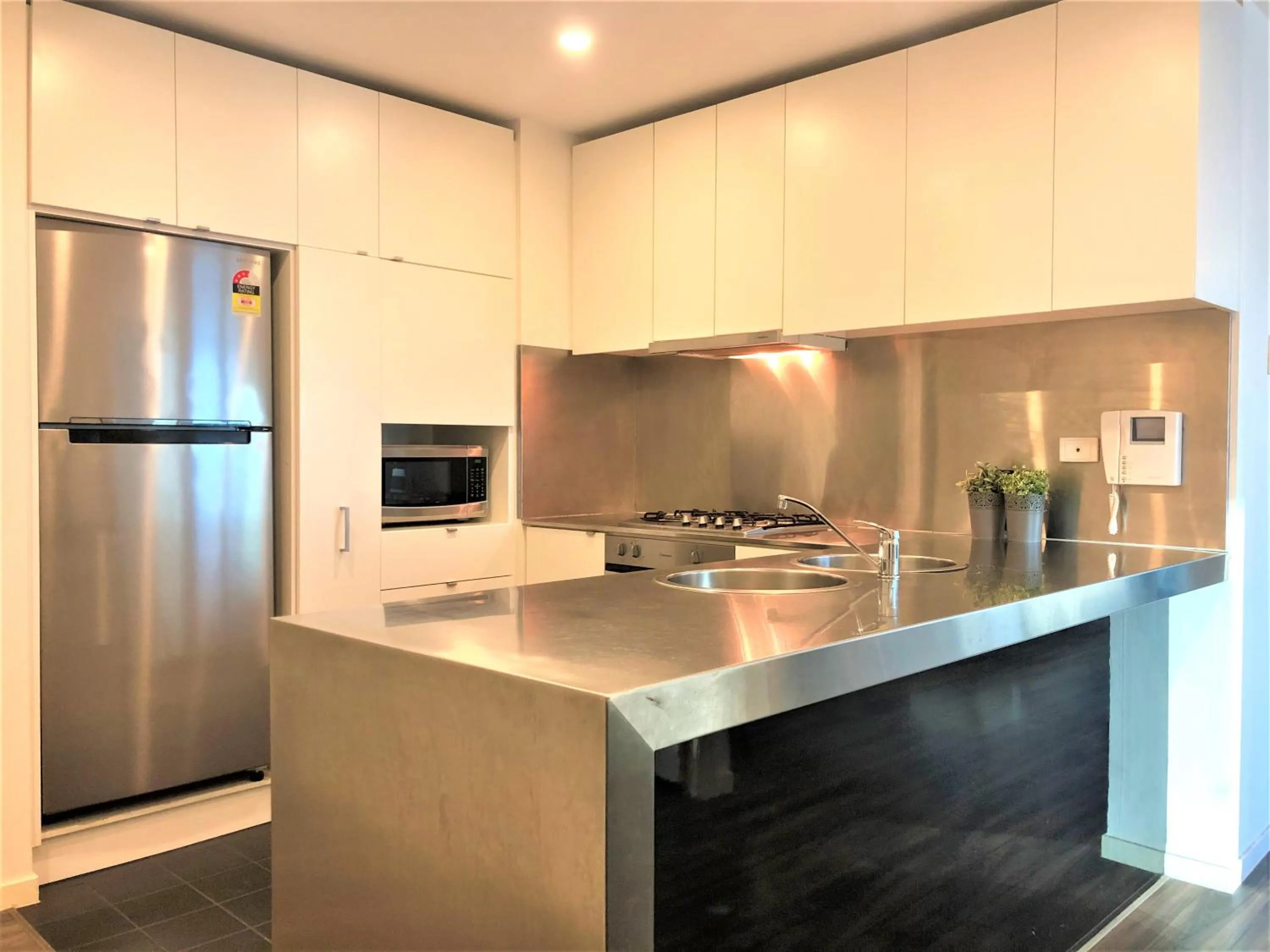 Kitchen or kitchenette in Readyset Apartments at Liberty