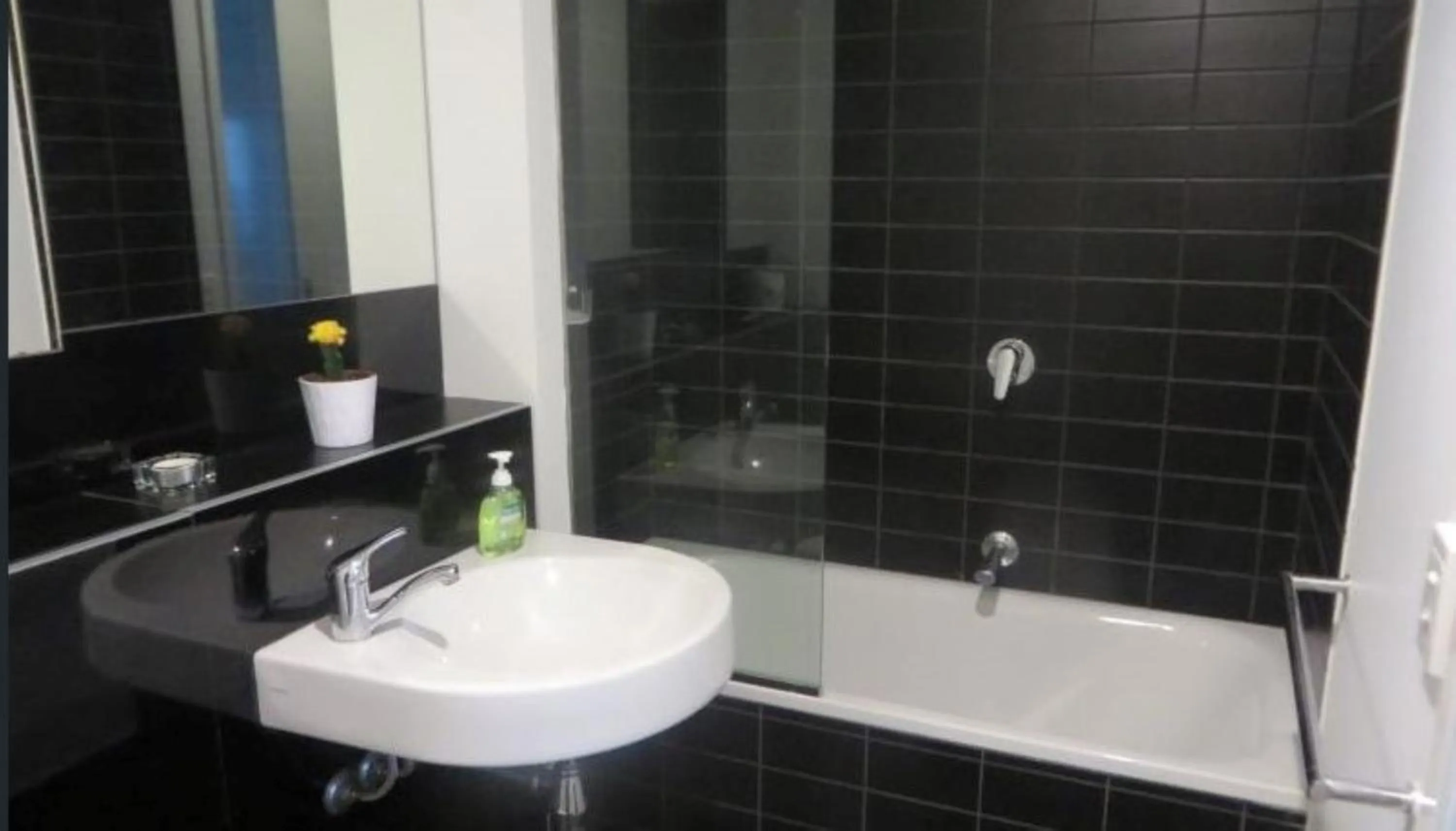 Shower in Readyset Apartments at Liberty