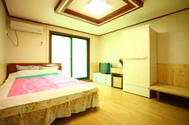 Bed in Bluesky Pension