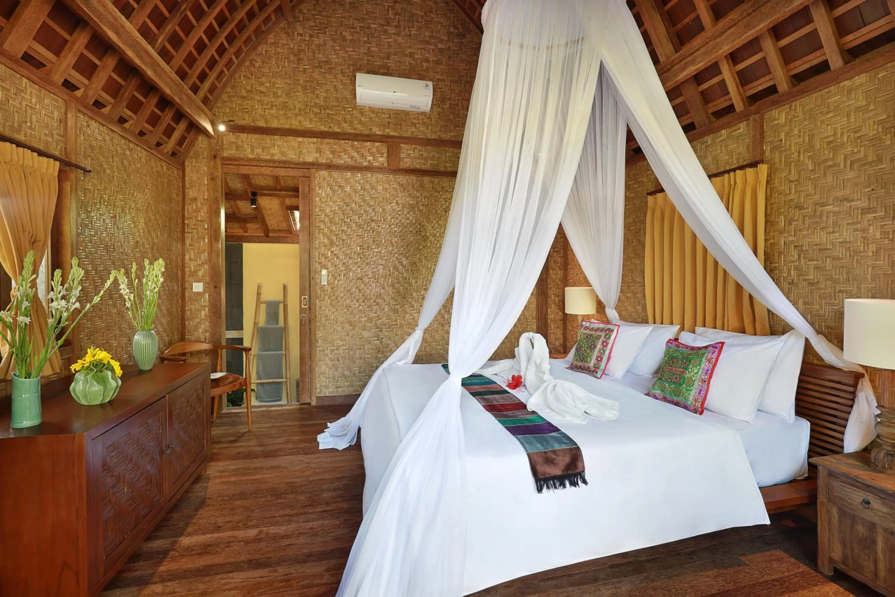 Bed in Uluwatu Lumbung Cottages