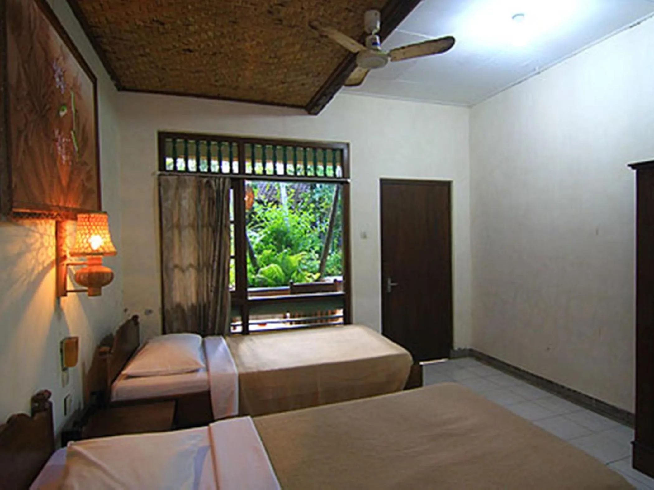 Photo of the whole room in Dewa Bharata Bungalows Candidasa