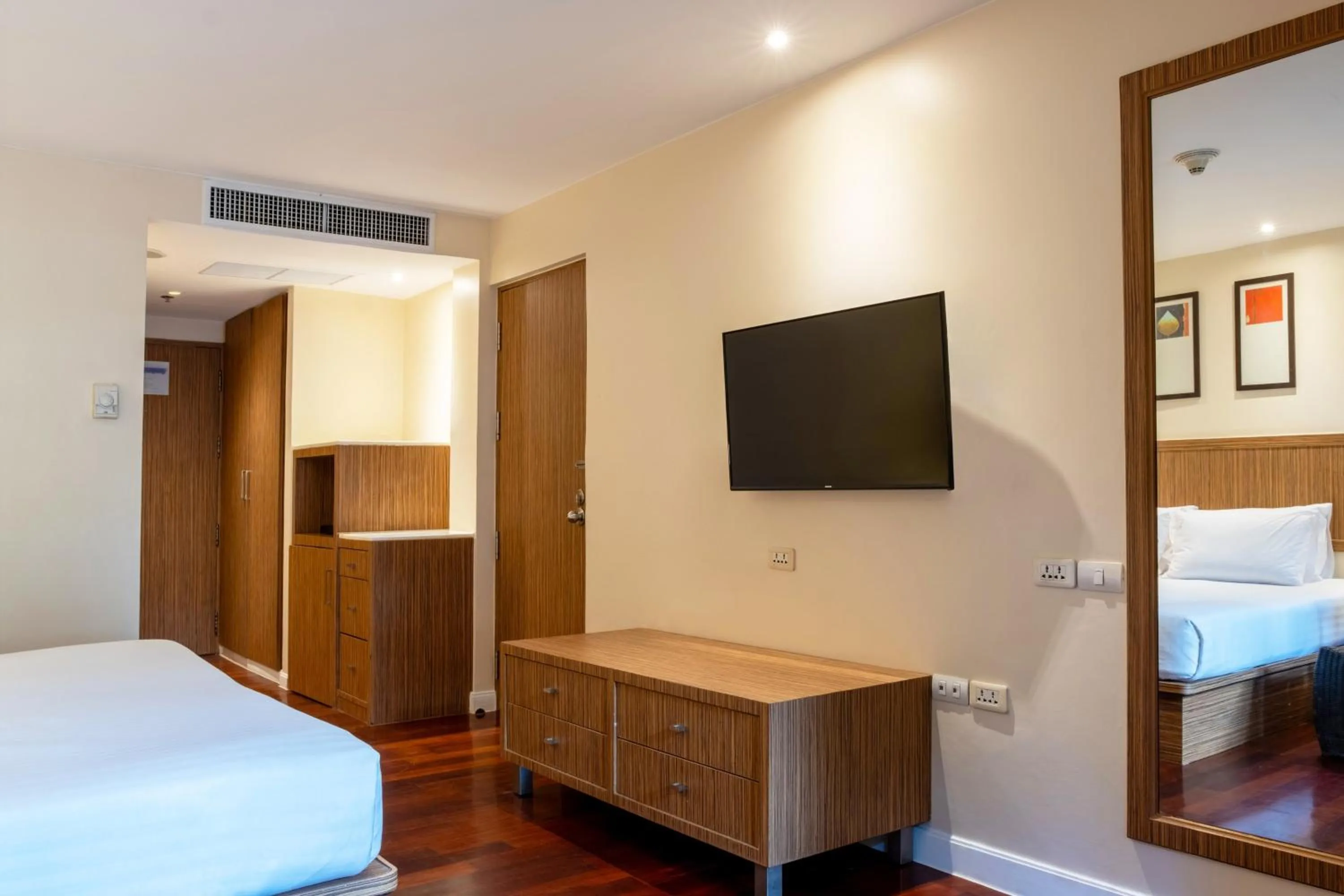 Photo of the whole room, TV/Entertainment Center in Destination Resorts Phuket Surin Beach - SHA Extra Plus