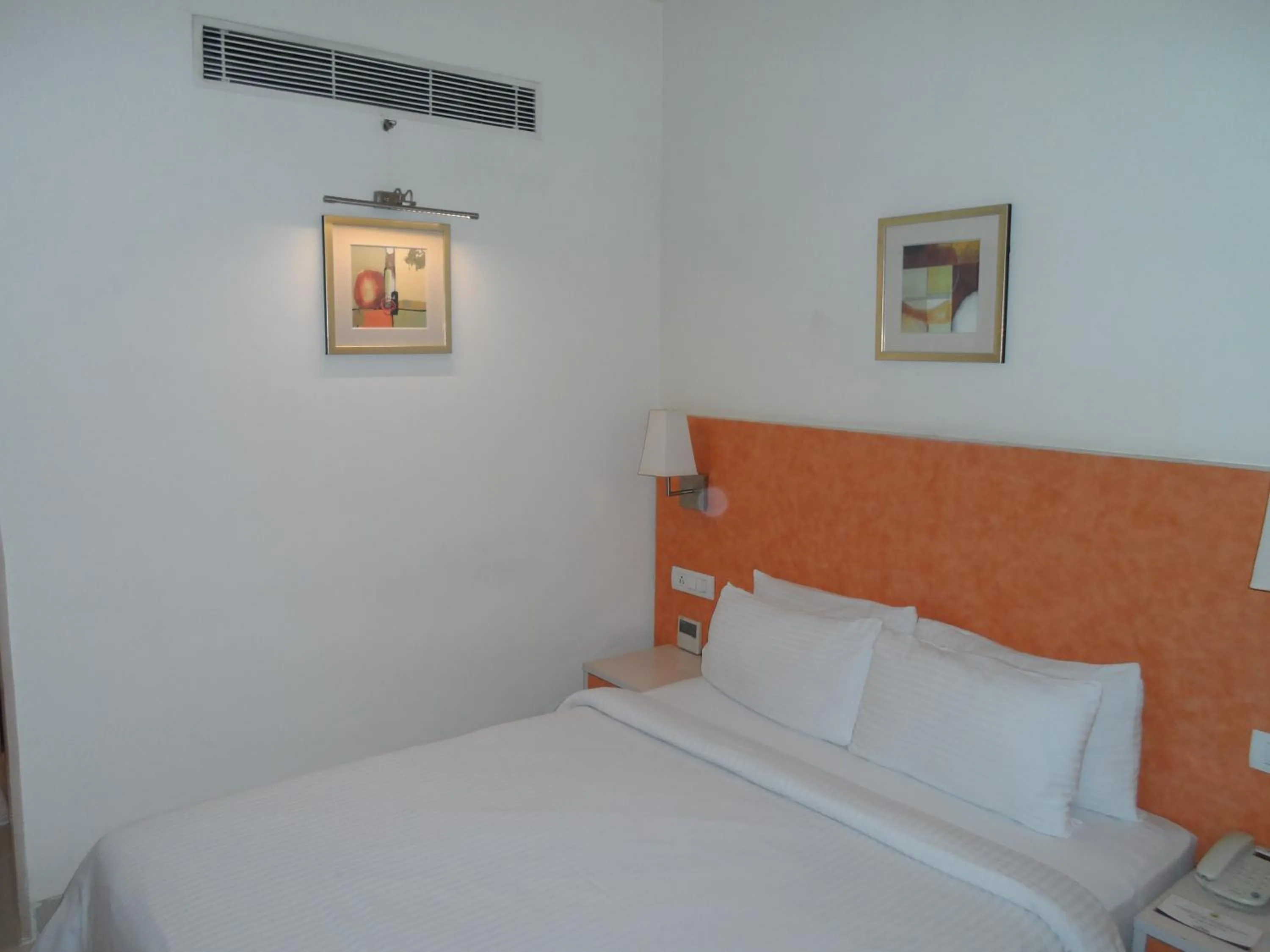 Bedroom, Bed in Aditya Hometel