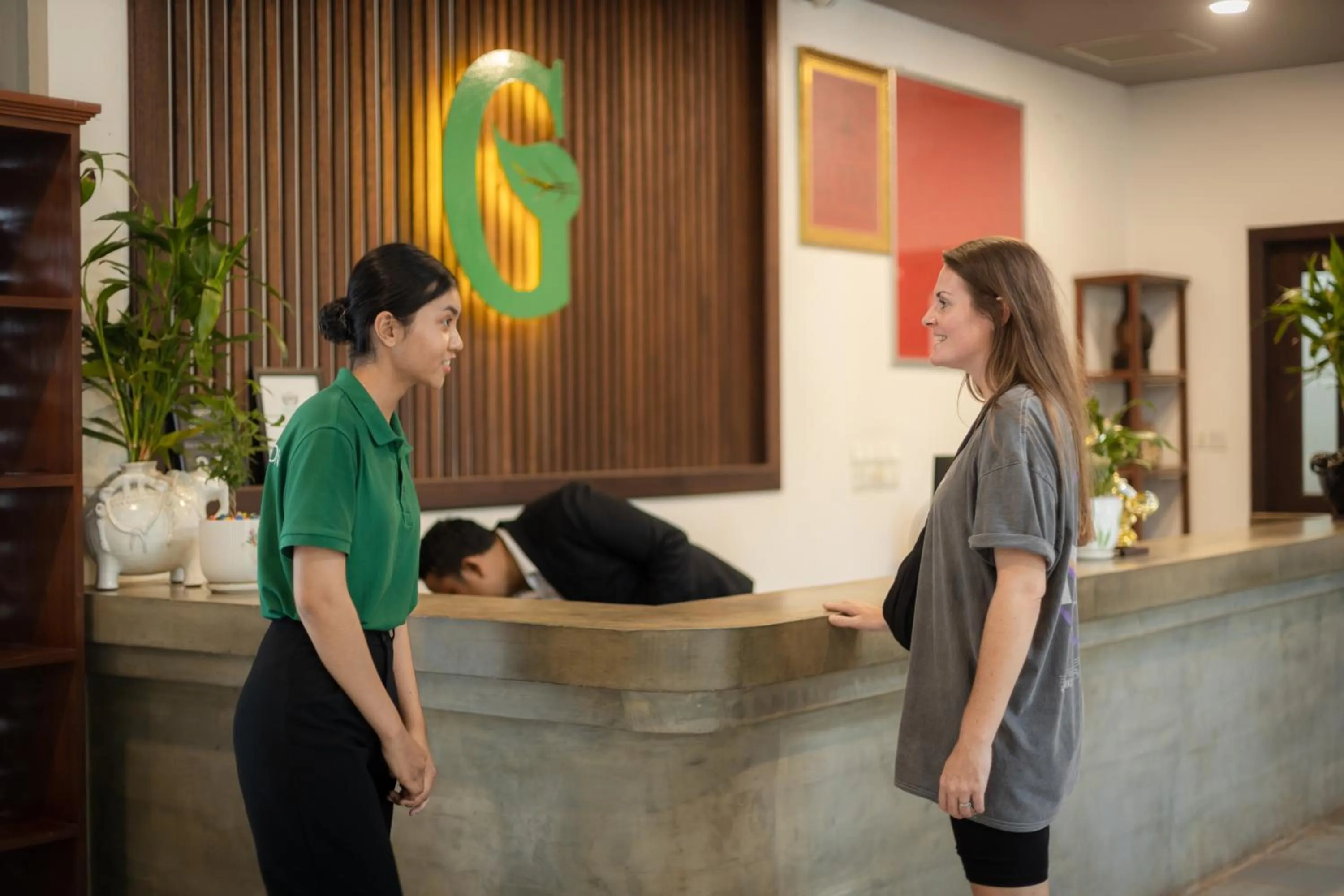 Staff in Green Amazon Residence