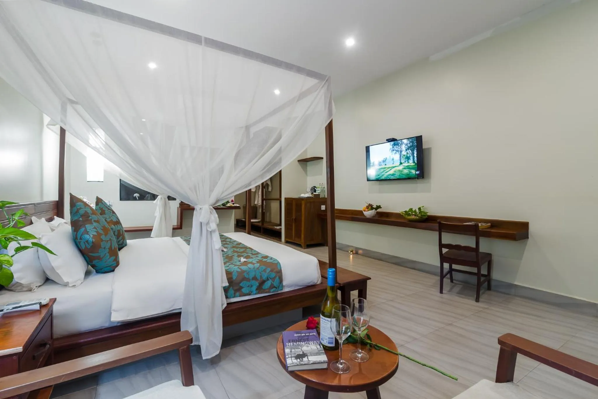Communal lounge/ TV room, Bed in Bayon Modern Residence