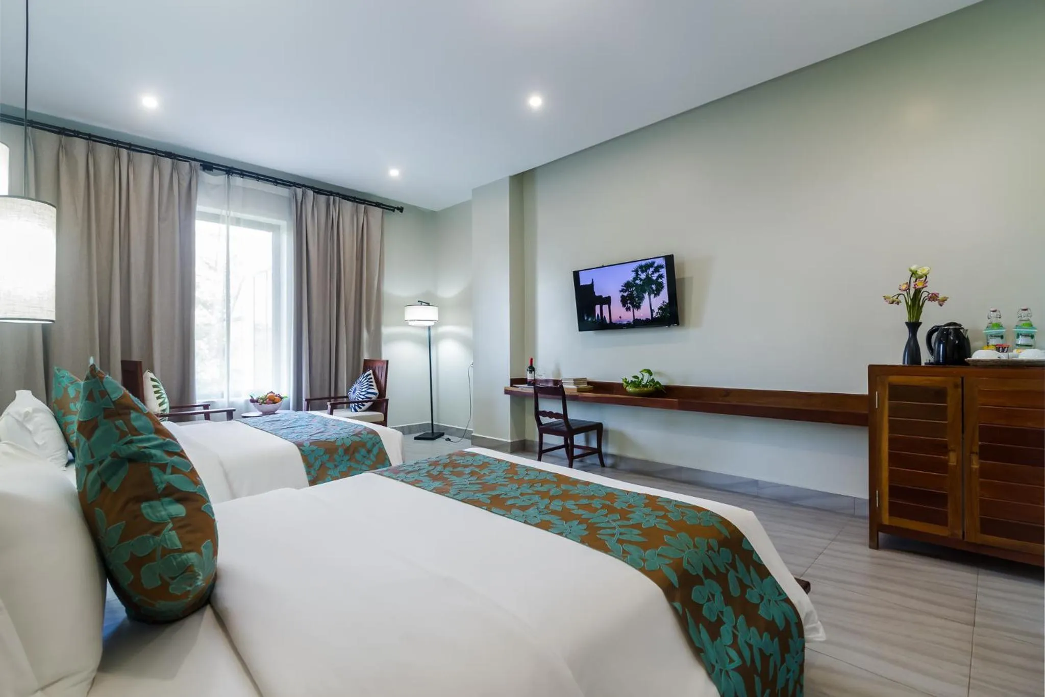 Communal lounge/ TV room, Bed in Bayon Modern Residence