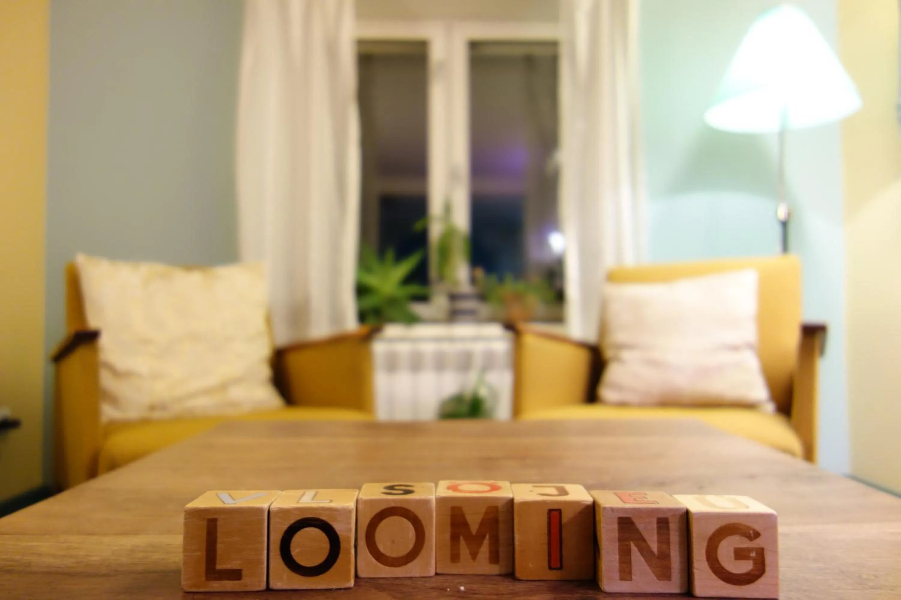 Communal lounge/ TV room, Bed in Looming Hostel