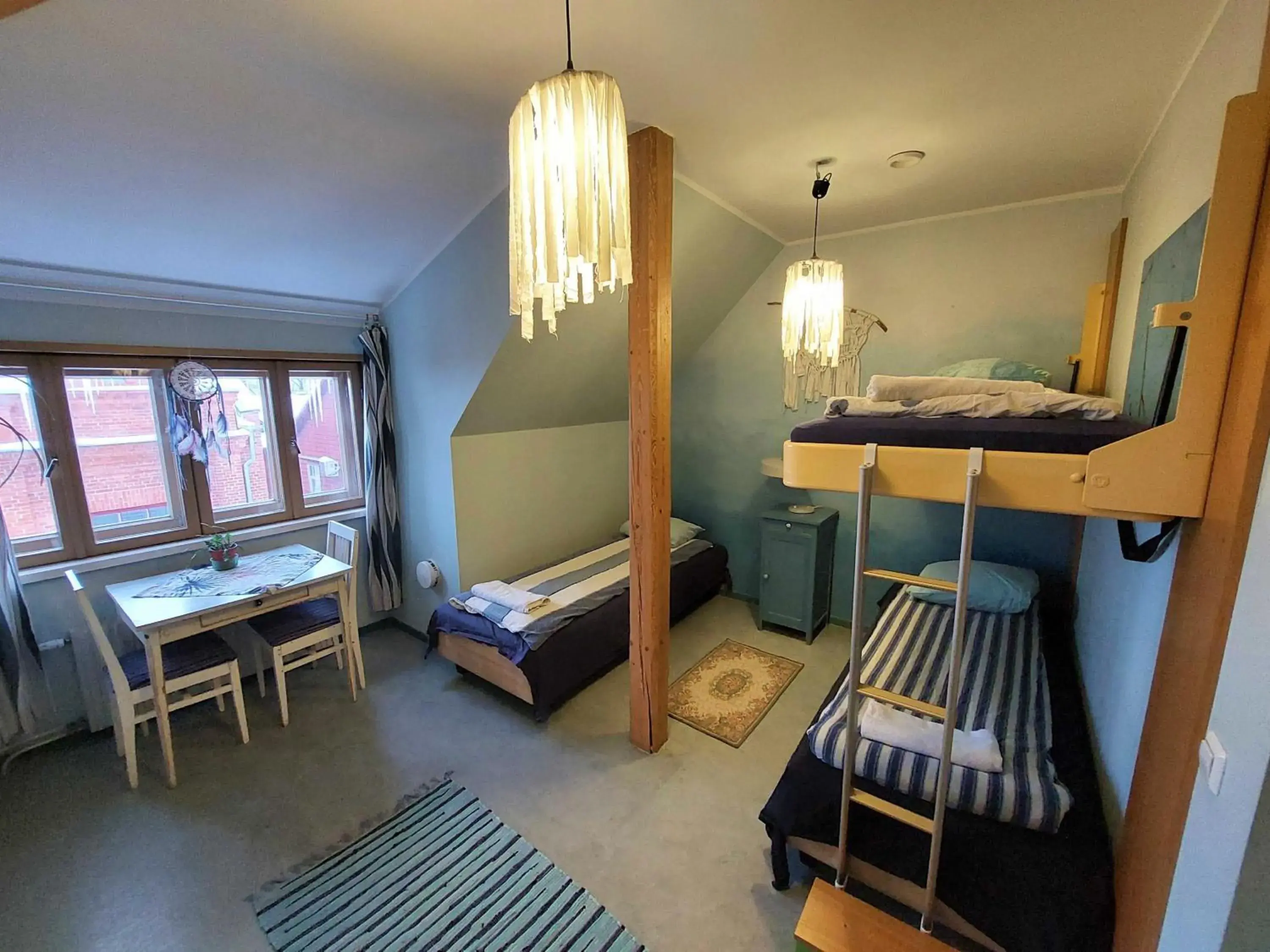 Family Room with Shared Bathroom in Looming Hostel Family Room with Shared Bathroom in Looming Hostel