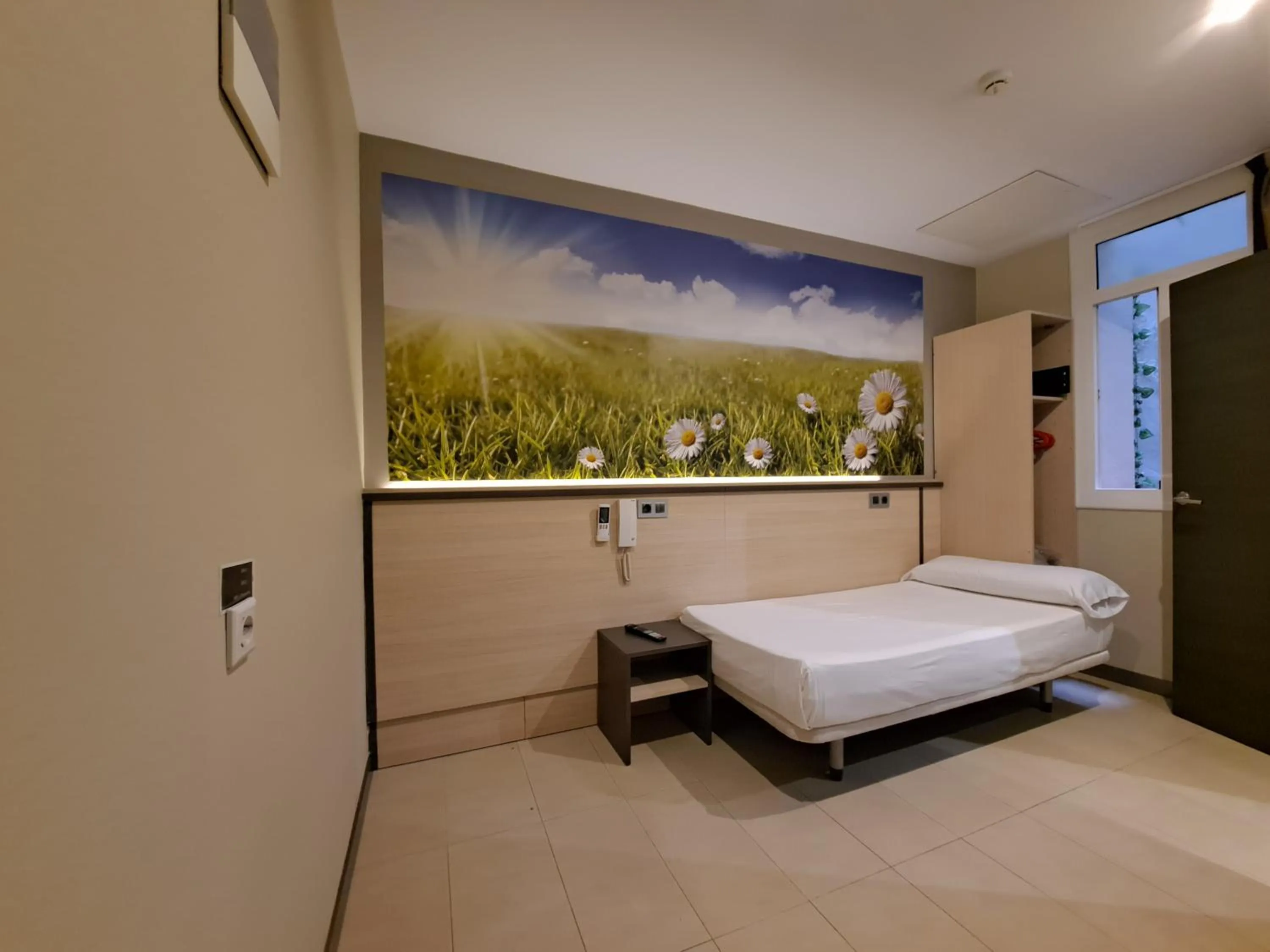 Photo of the whole room, Bed in Hostal Las Flores Ramblas