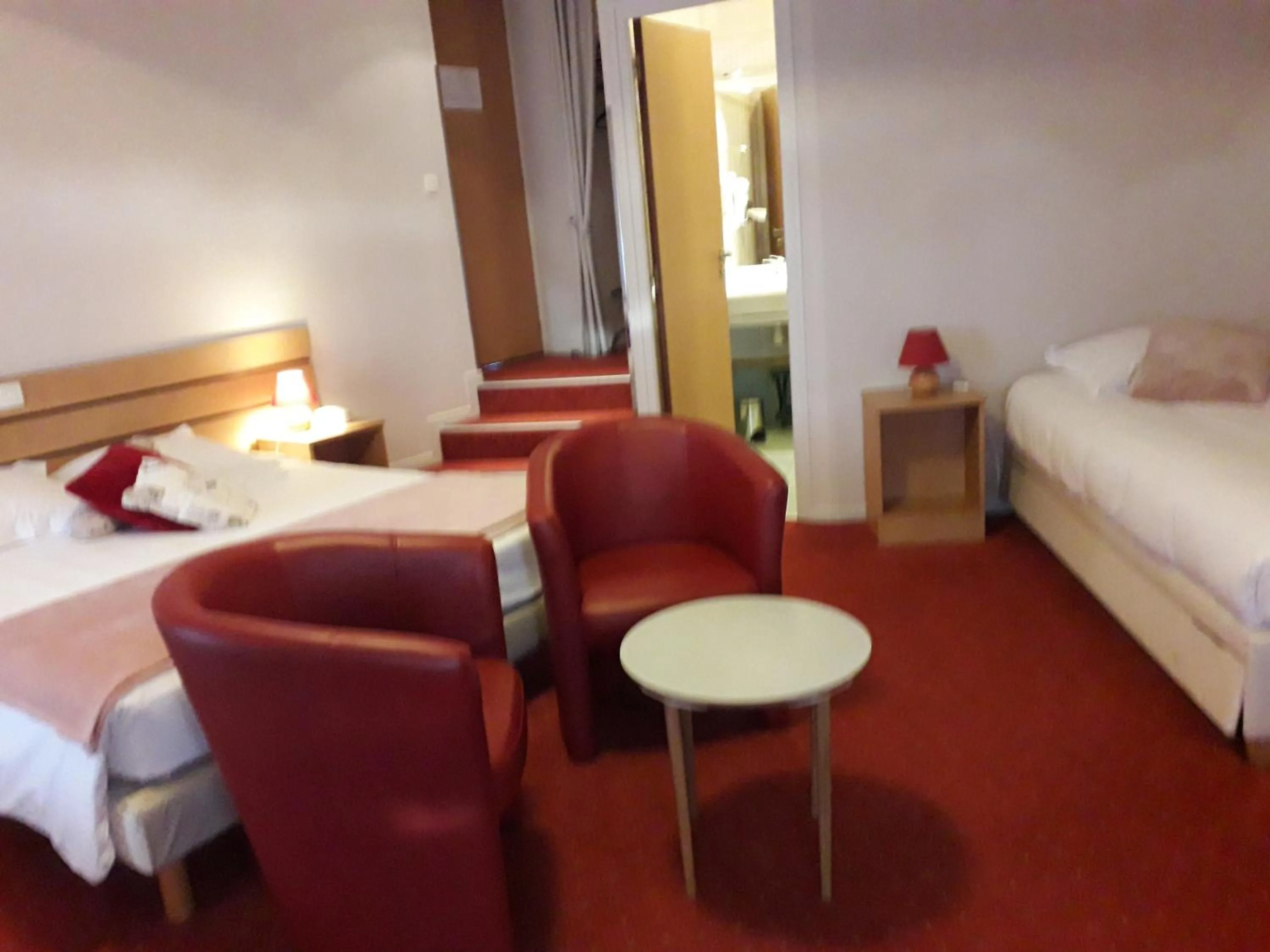 Bed in Logis La Renaissance