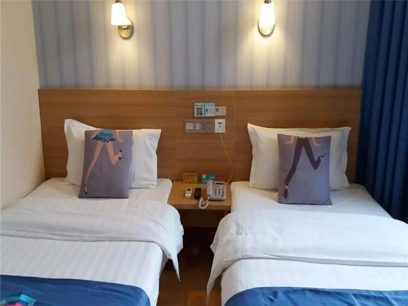 Bed in Pai Hotel Nanjing Maogaoqiao Metro Station