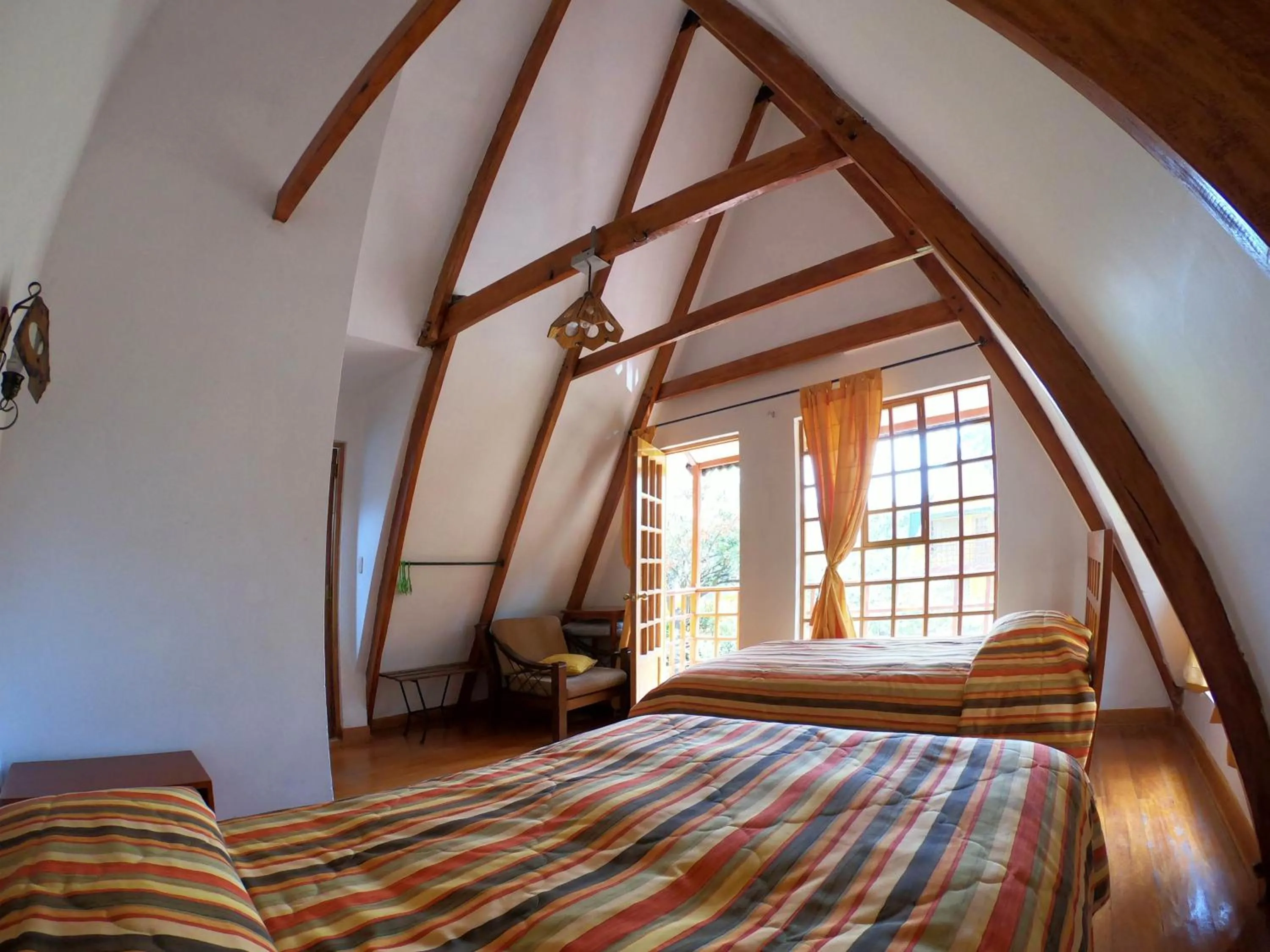 Bed in Amaru Valle Hotel