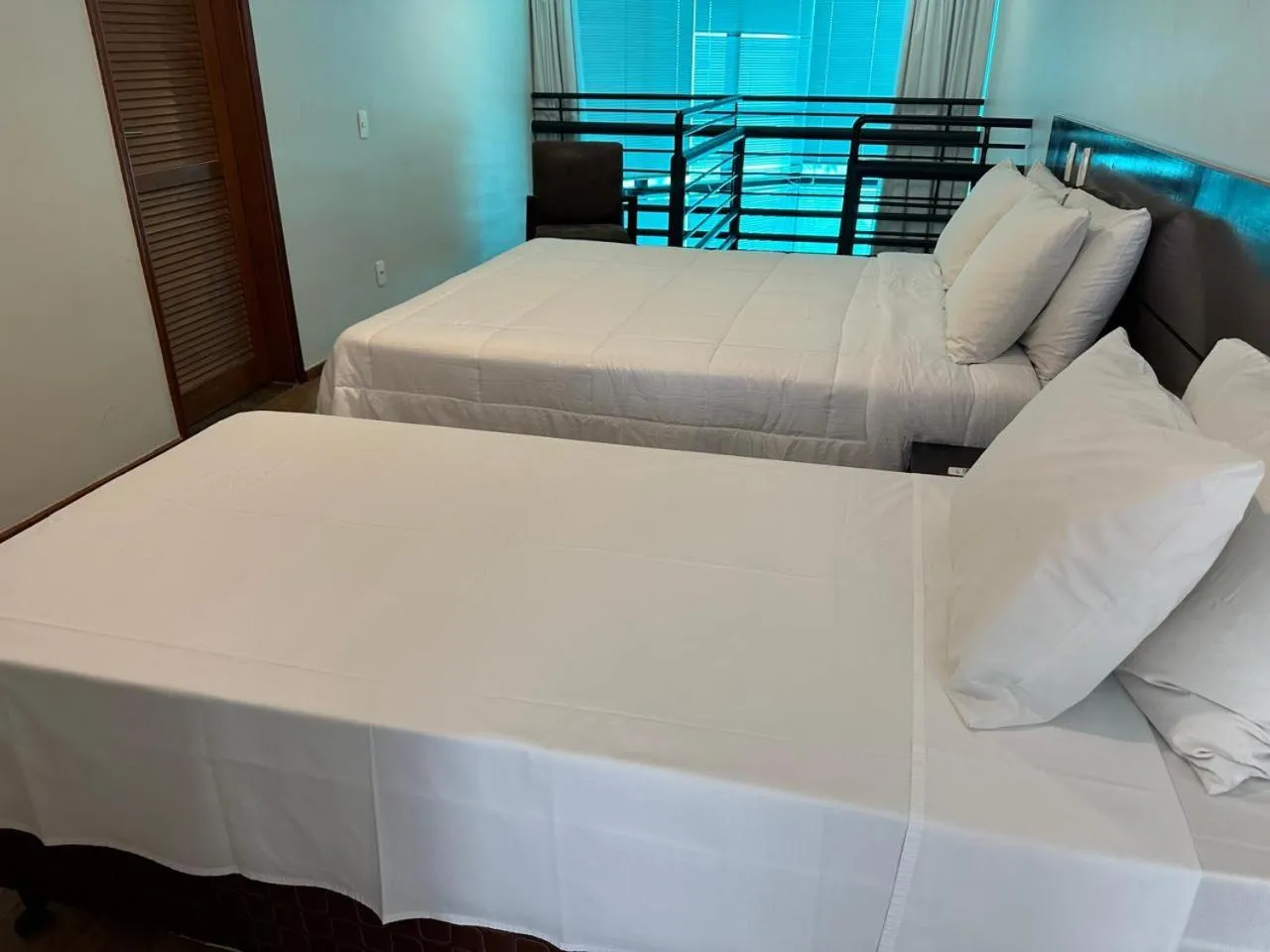 Bed in Bahamas Duplex by WS