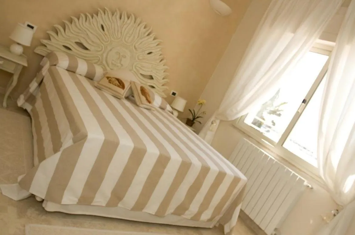 Bed in Hotel Bagni Lido