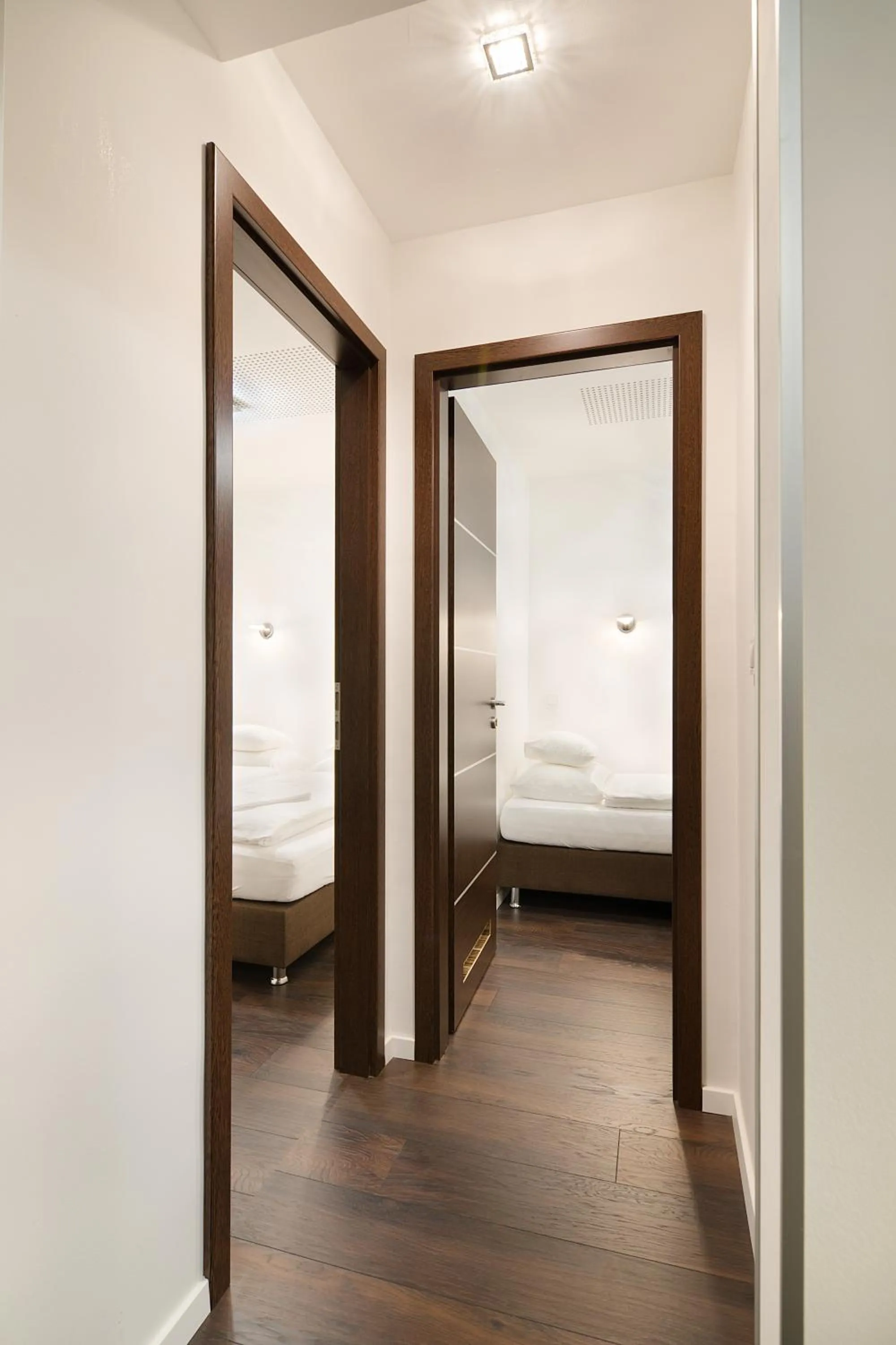 Bed in Paulay Downtown Apartments