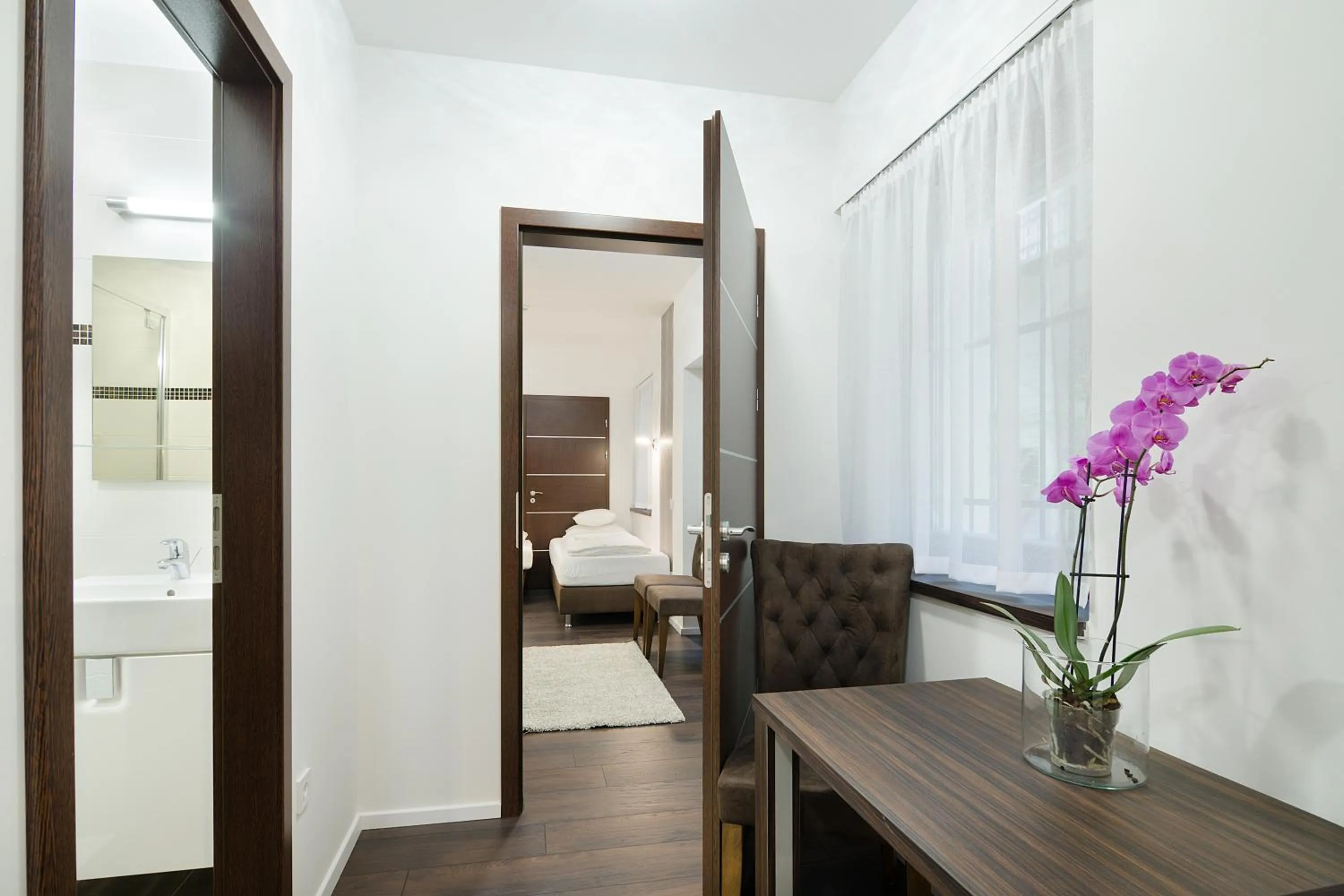 Bed in Paulay Downtown Apartments