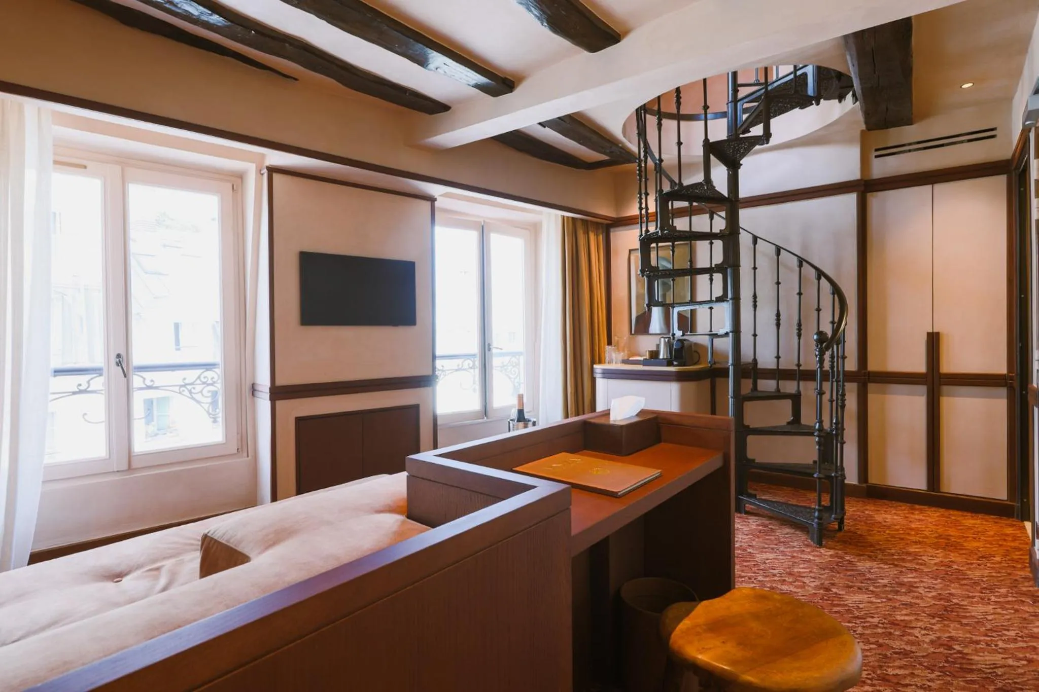 Communal lounge/ TV room in Boutique Hôtel Konfidentiel