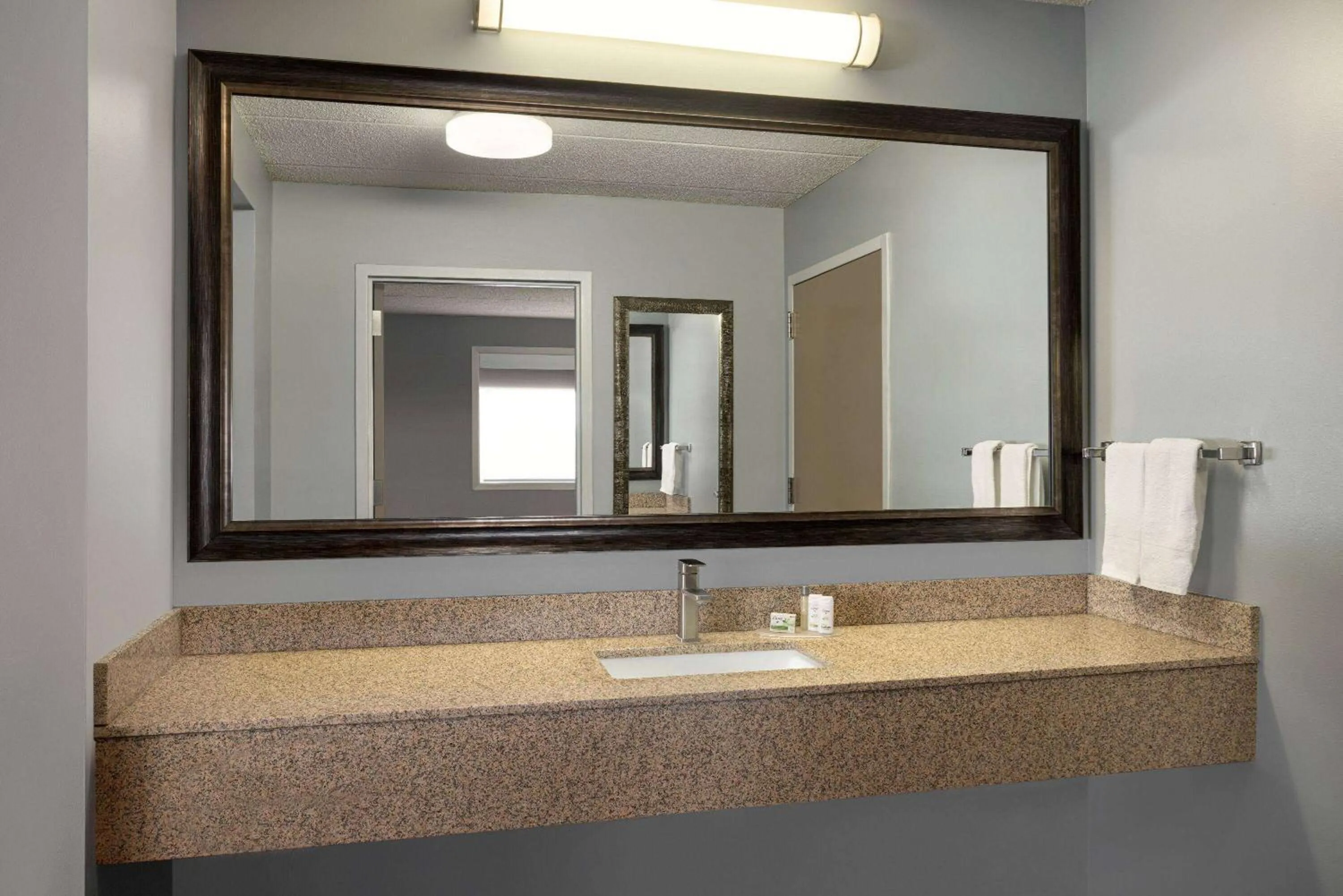 Bathroom in AmericInn by Wyndham Inver Grove Heights Minneapolis
