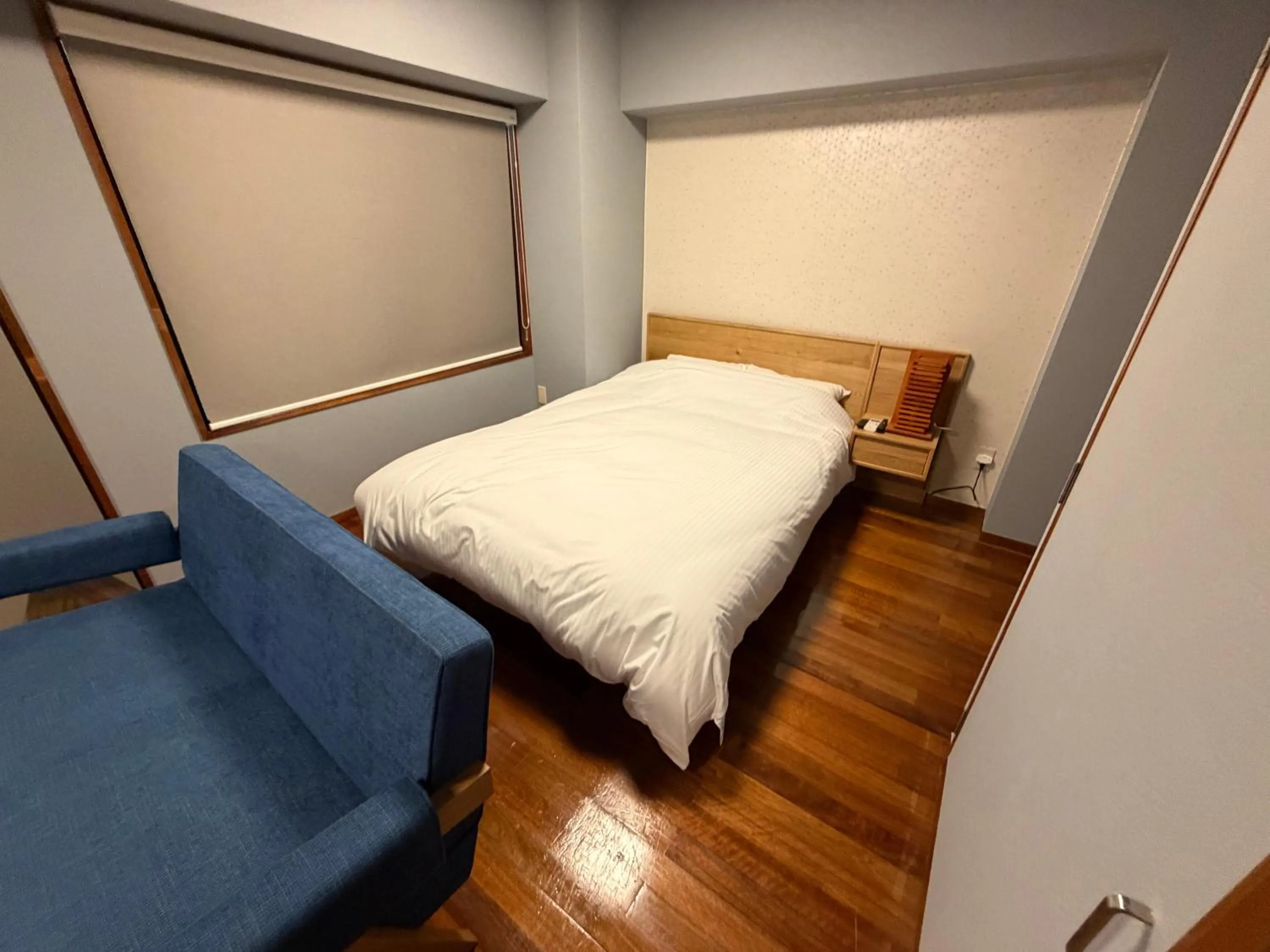 Bed in Kokusai Towns Inn