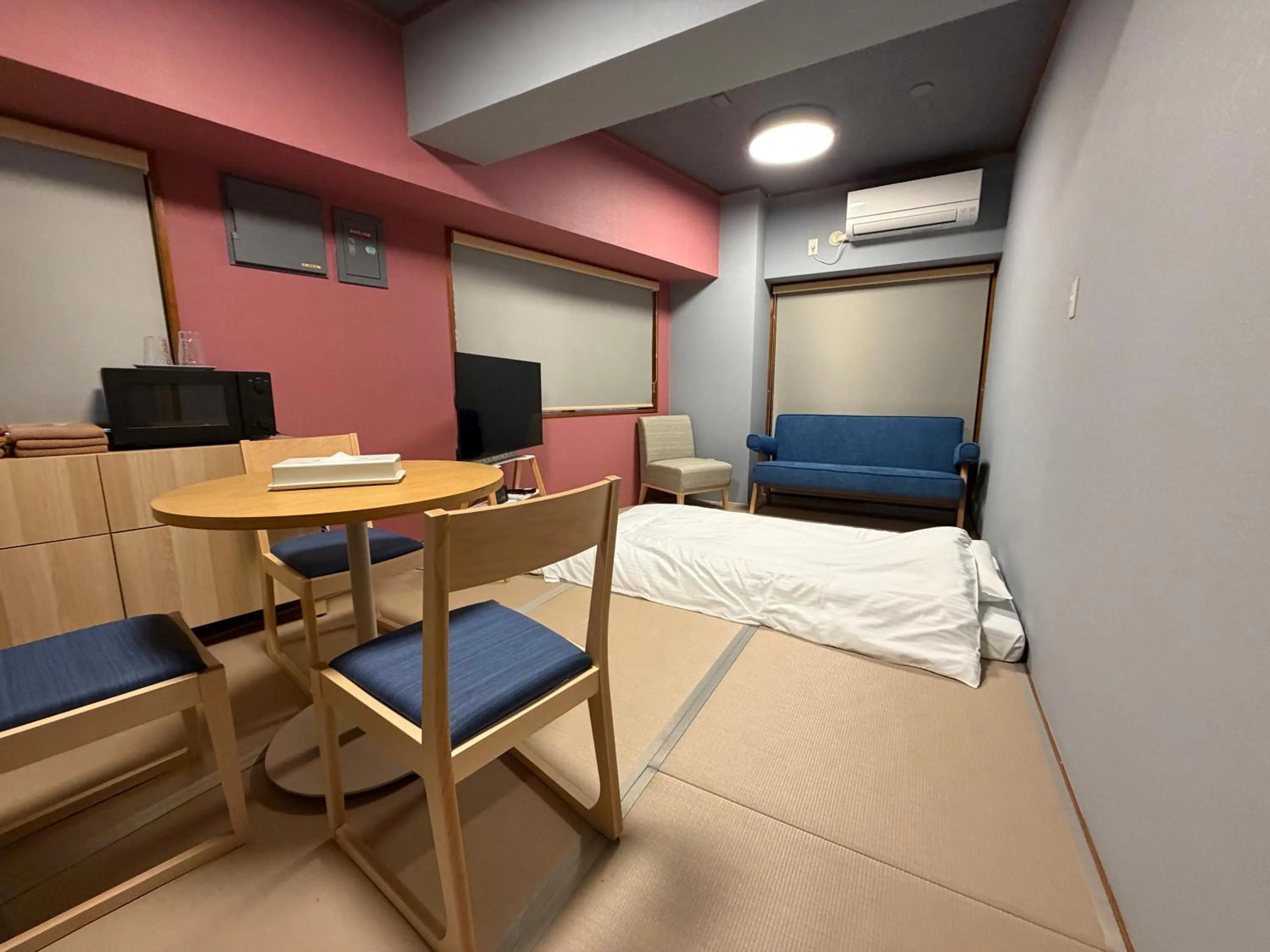 Bed in Kokusai Towns Inn