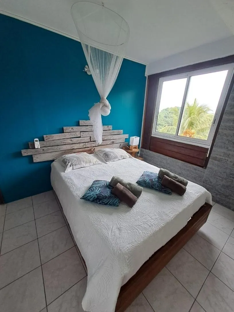 Bed in Chez Karine & Harold