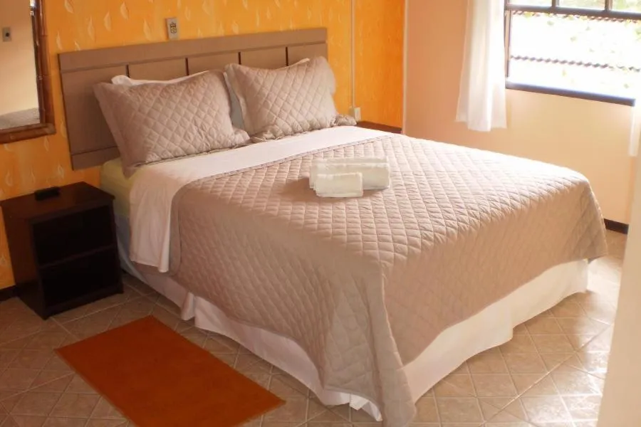 Bed in Pousada Estrela do Mar