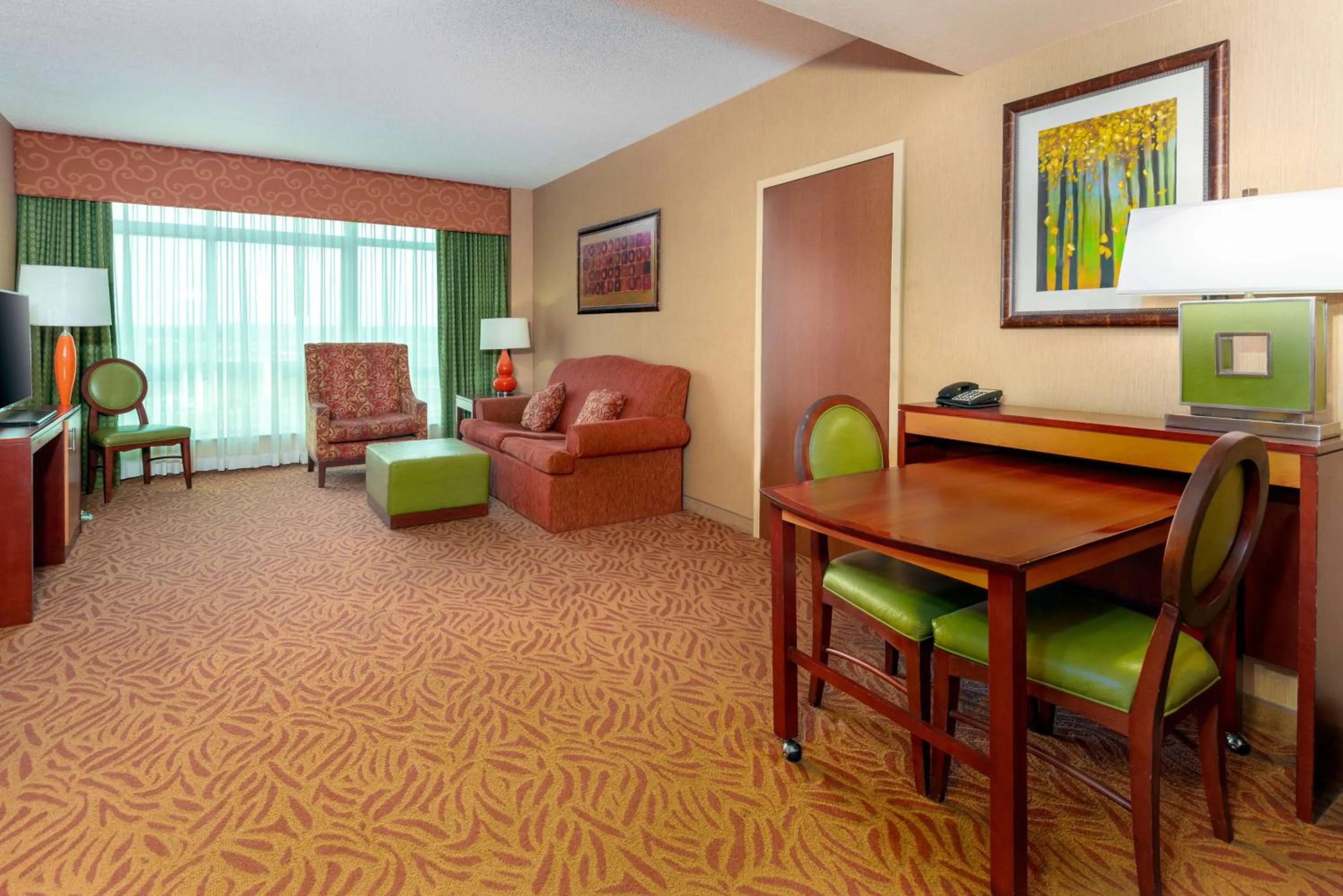 Living room in Embassy Suites Omaha- La Vista/ Hotel & Conference Center