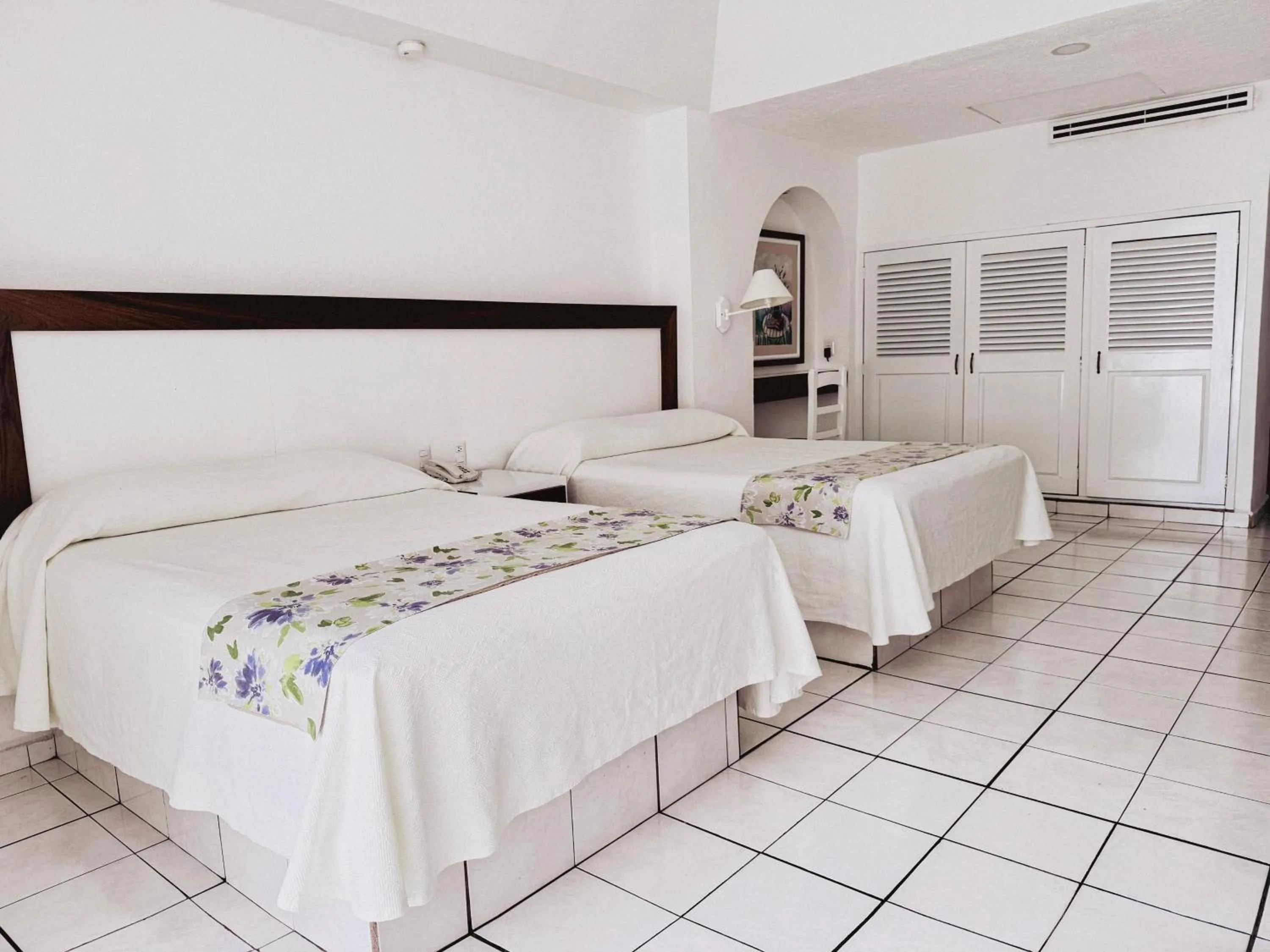 Bed in Tropicana Hotel Puerto Vallarta