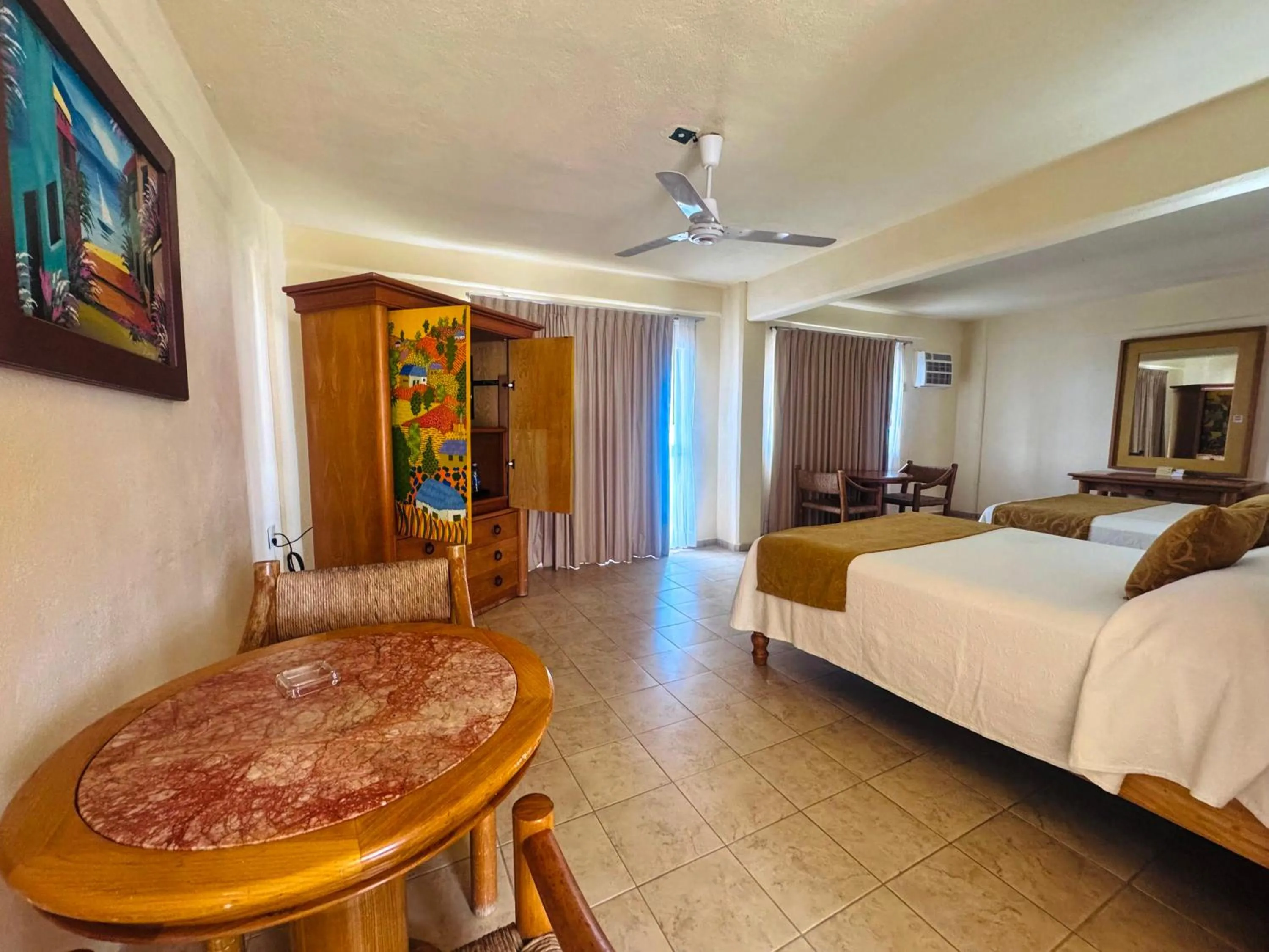 Bed in Tropicana Hotel Puerto Vallarta