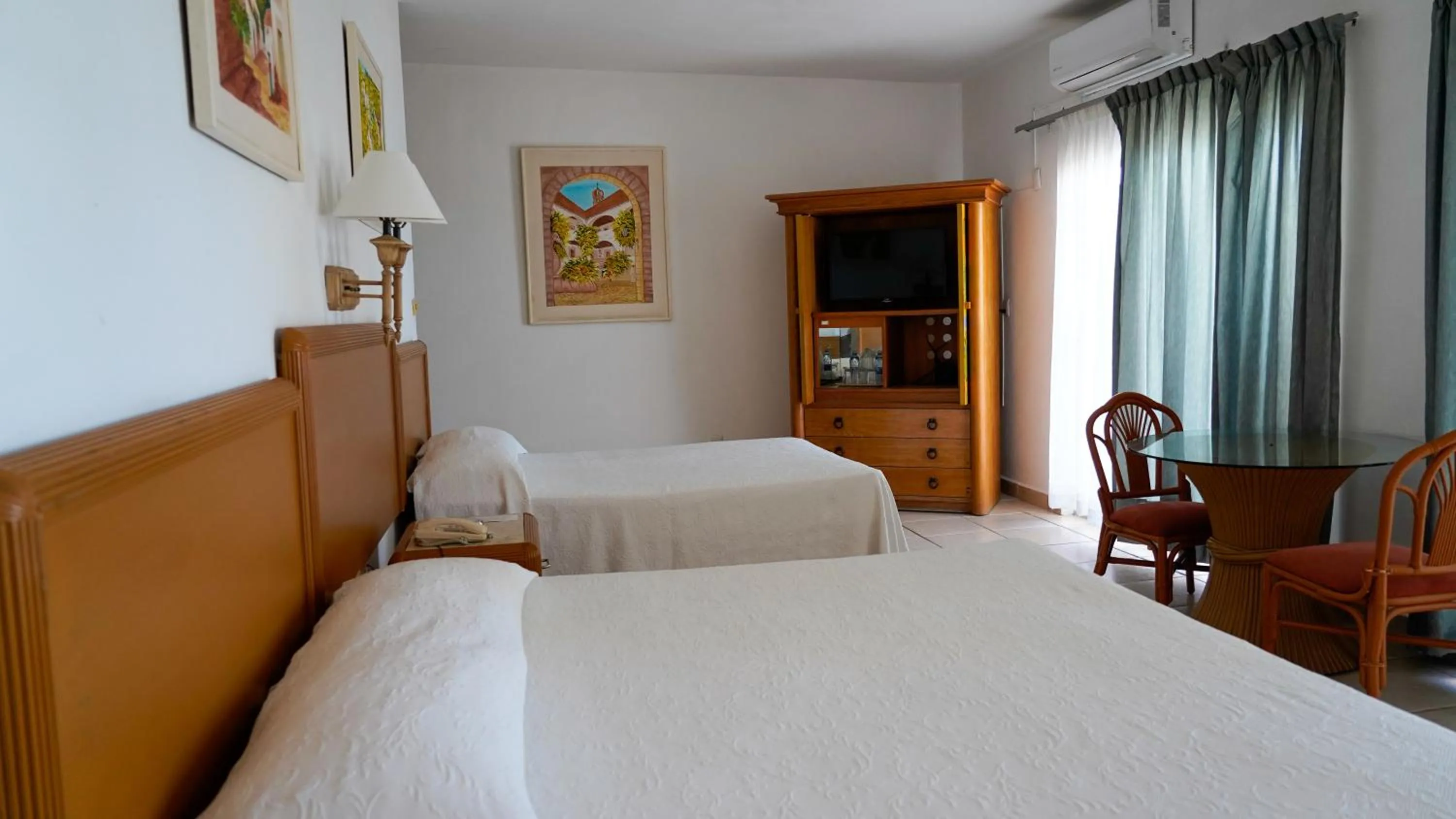 Bed in Tropicana Hotel Puerto Vallarta