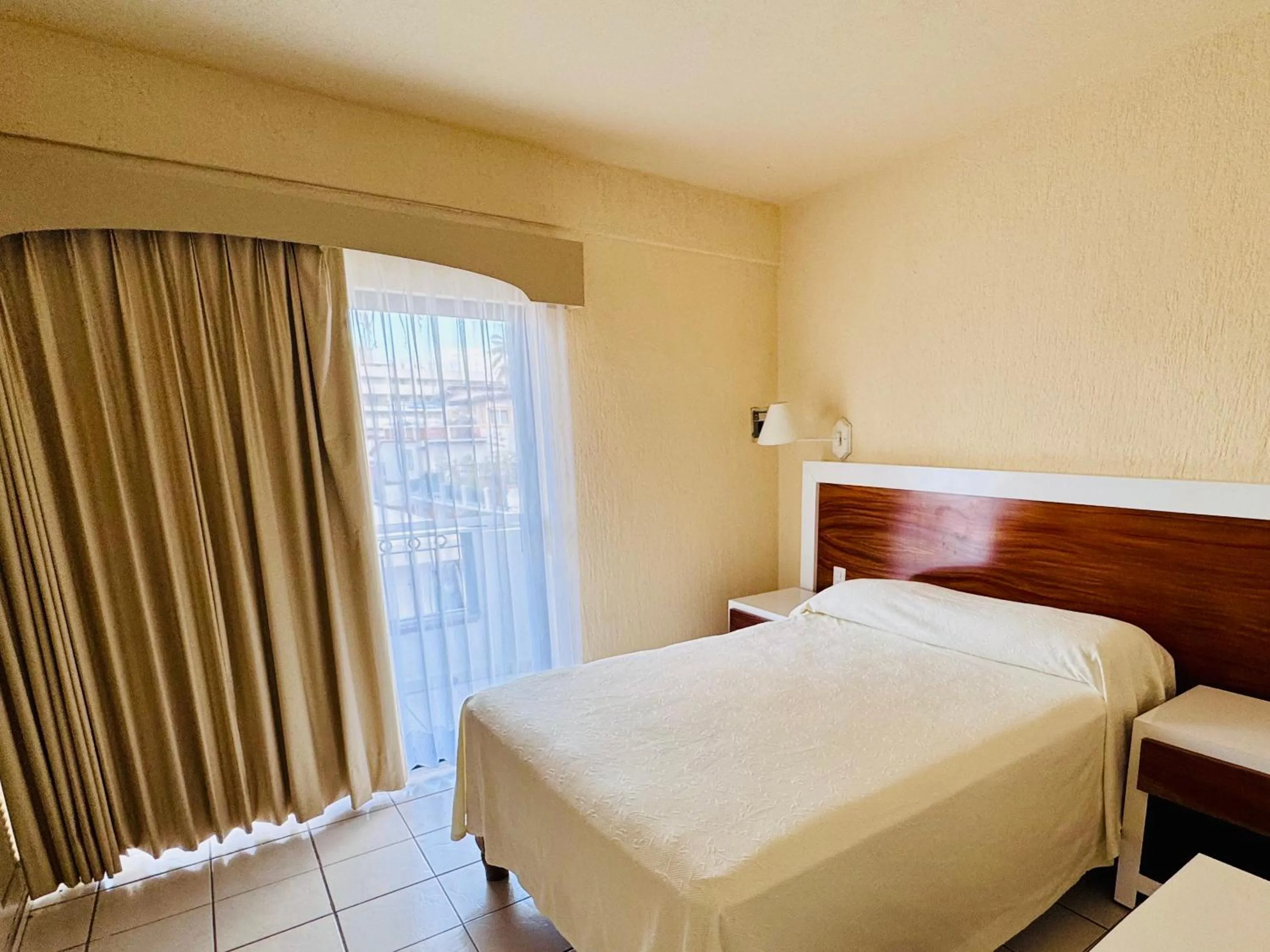 Bed in Tropicana Hotel Puerto Vallarta