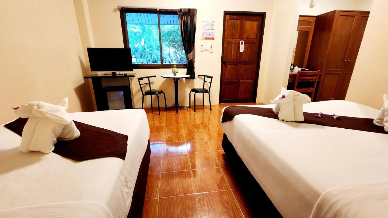 Bed in Mild Garden View Resort