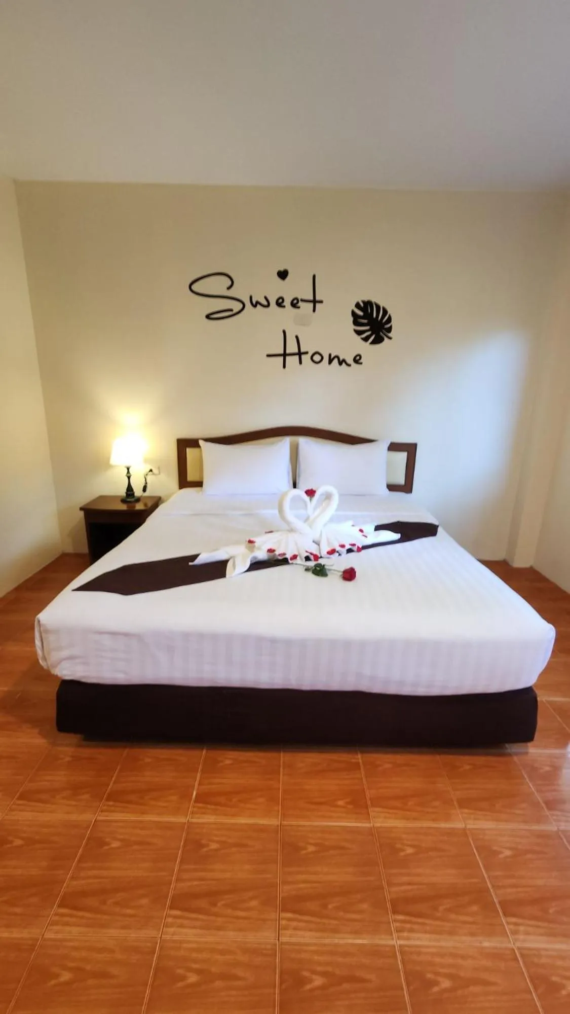 Bed in Mild Garden View Resort