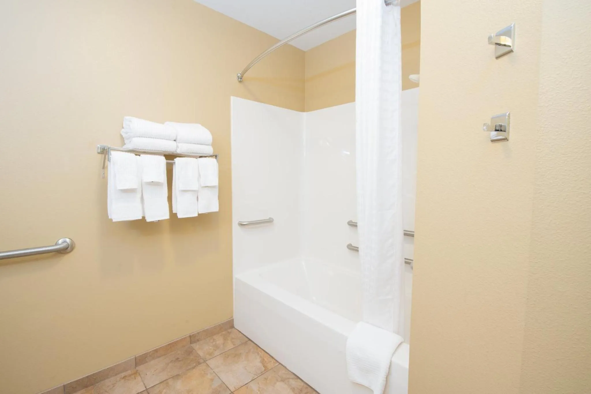 Bathroom in Candlewood Suites Minot by IHG